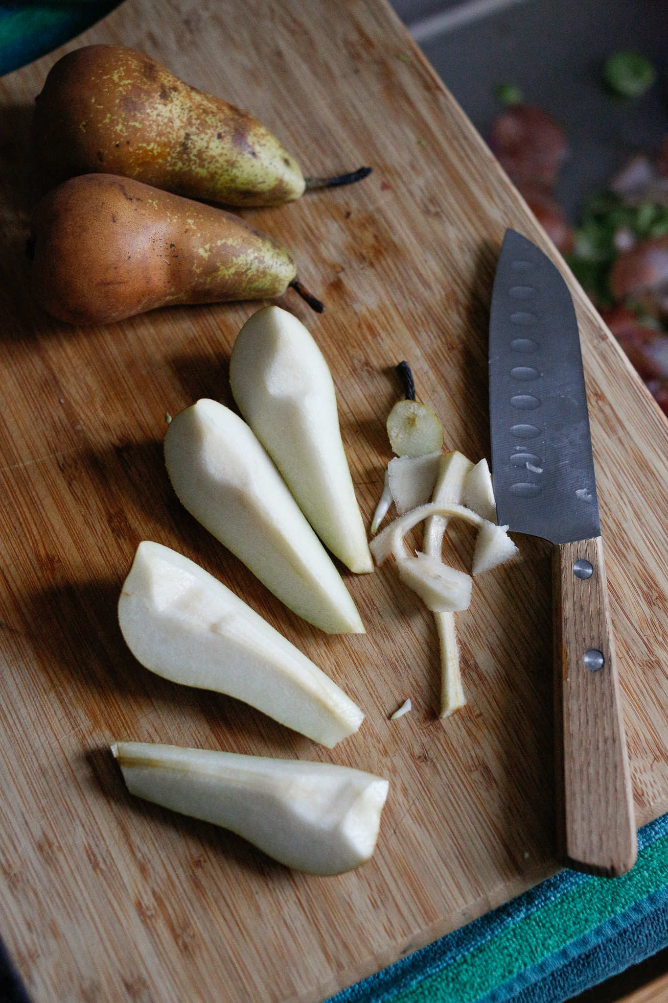 Core and quarter your pears. I leave on the peel to keep the cooked pears intact