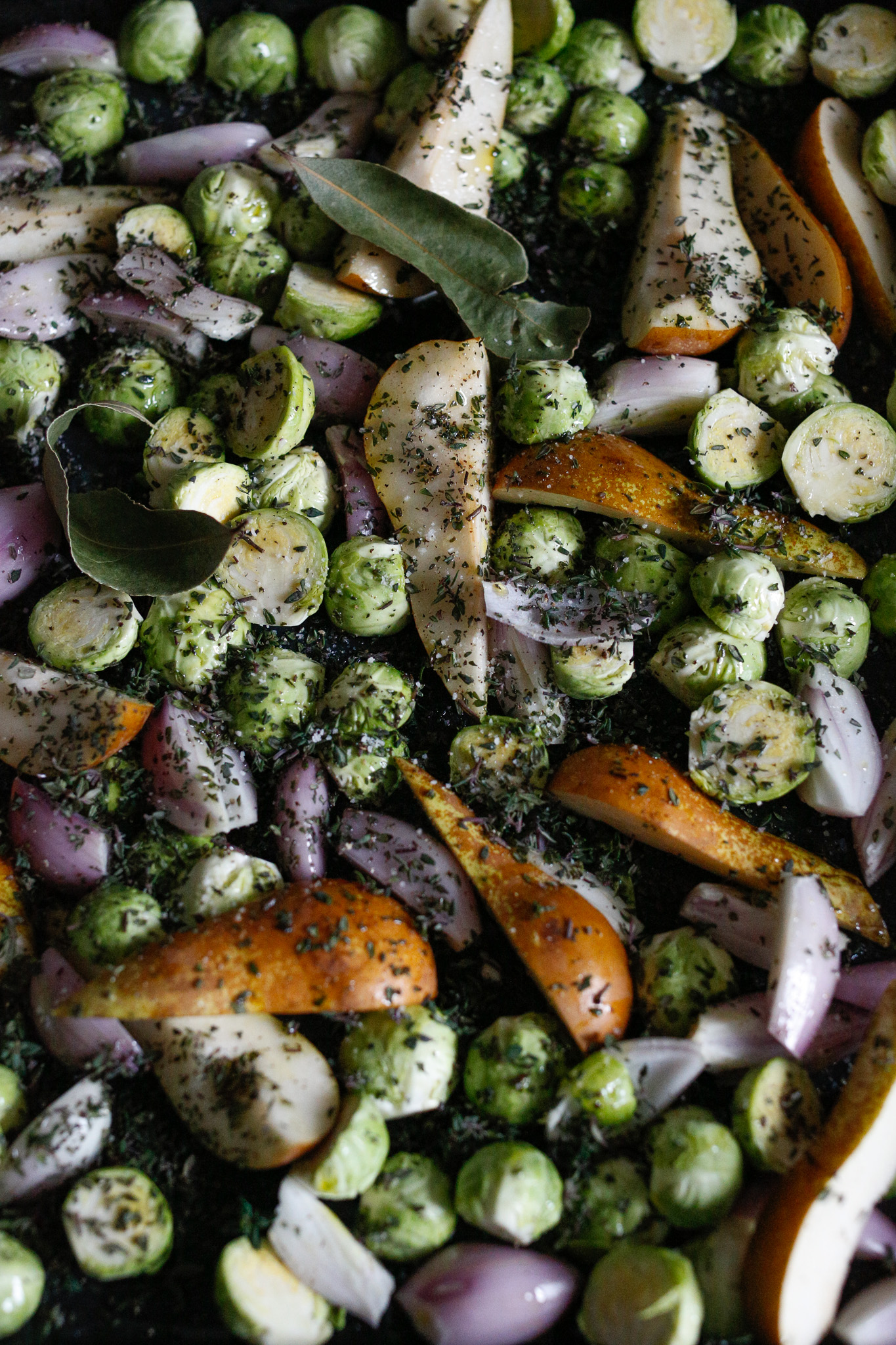 Evenly sprinkle your thyme around, salt & pepper. Add your bay leaves