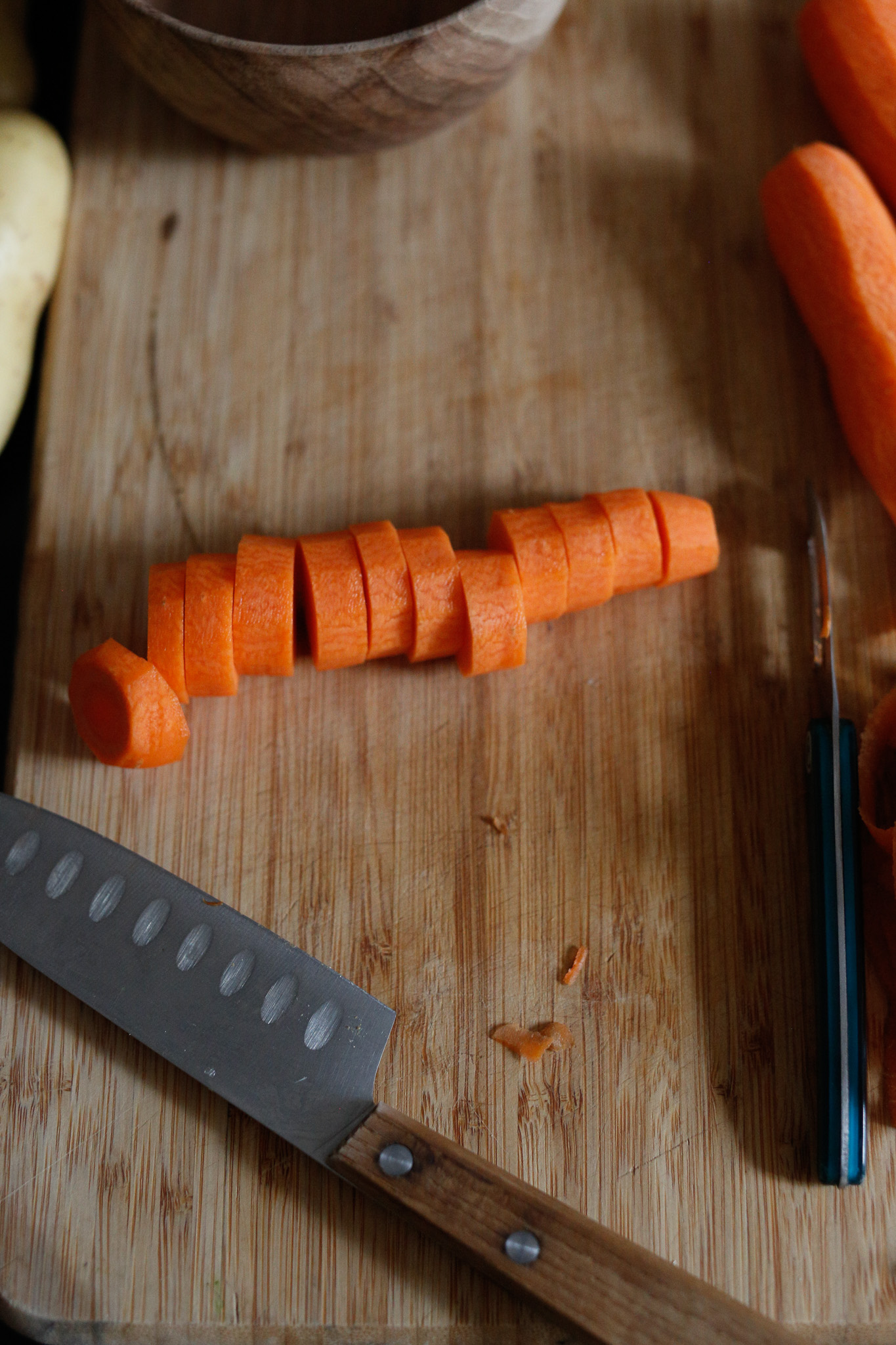 Cut up carrots with your knife