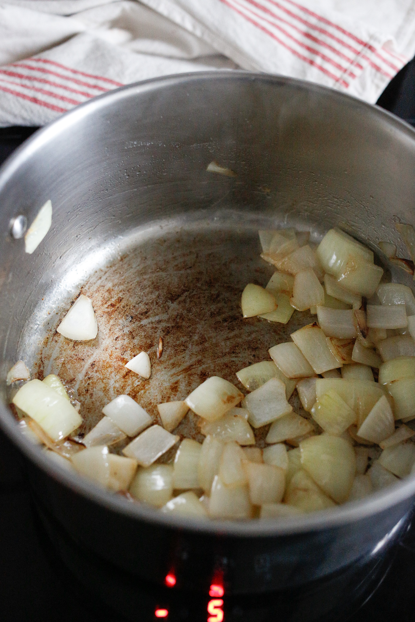 When your pan is starting to brown like so, add in your vinegar to deglaze your pan