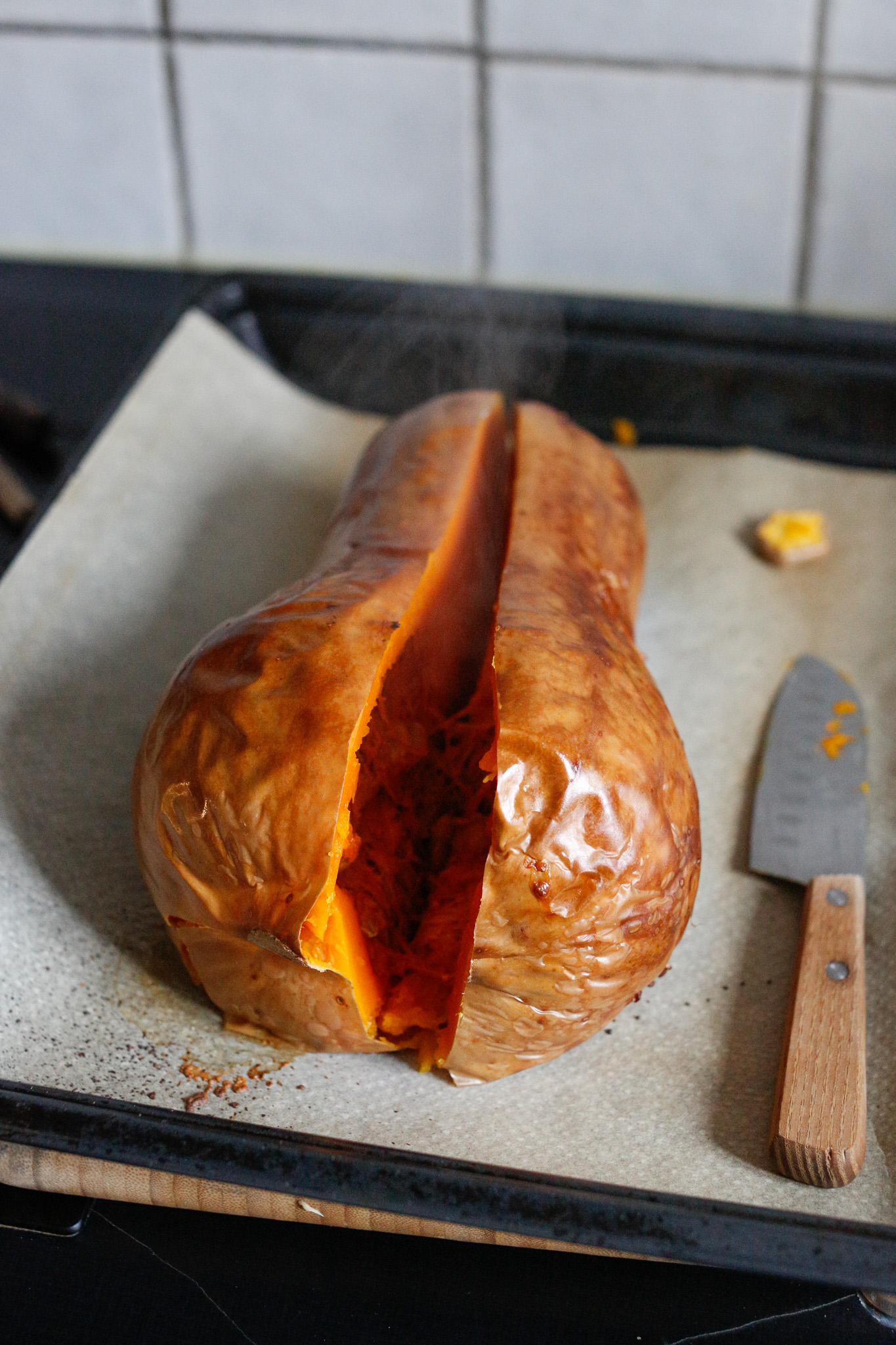 Cut down the center of the squash to release the steam. Be mindful as steam is very hot!