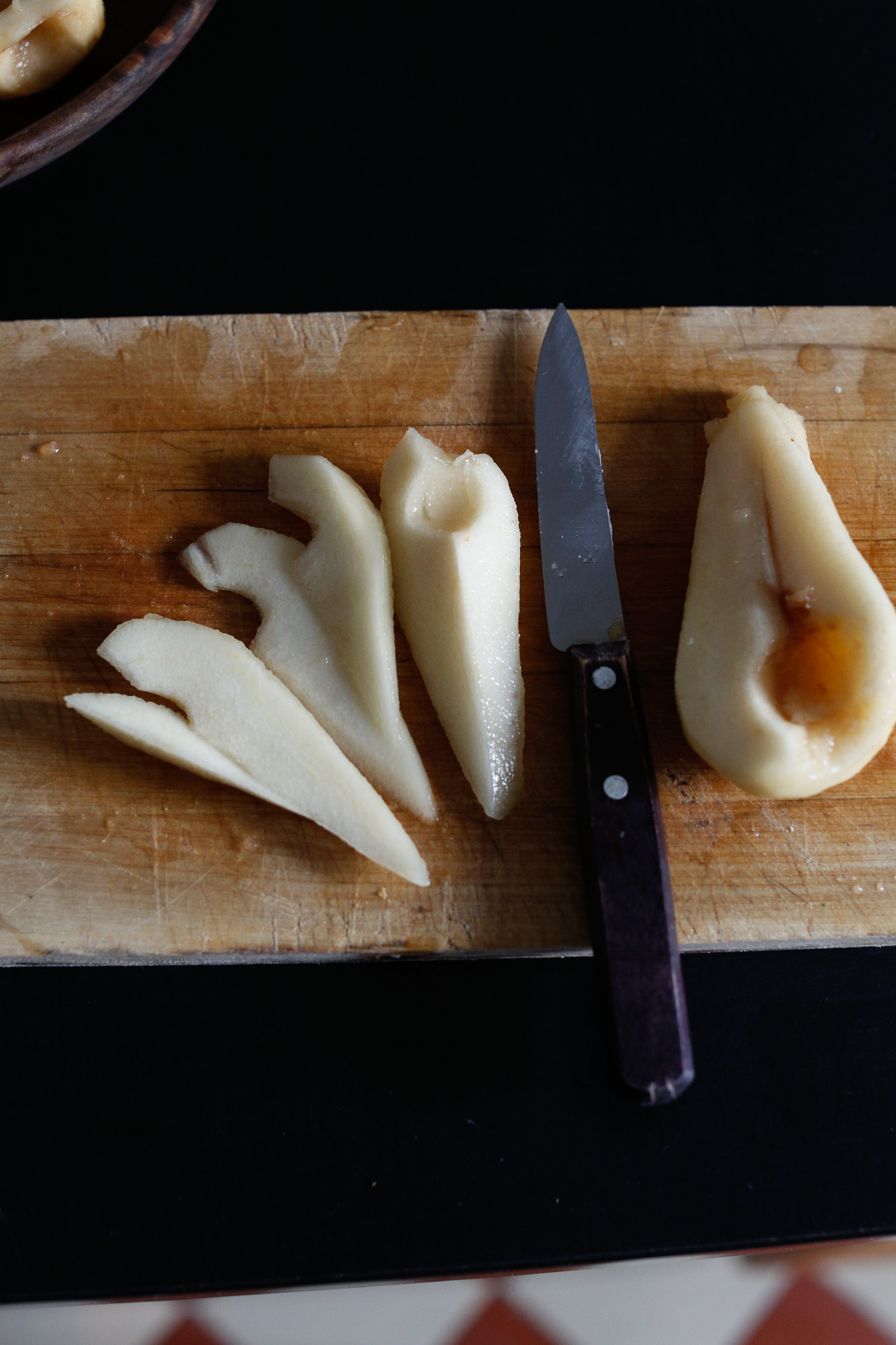 Cut your pear into thin slices and lay into a swirl on the bottom of your lightly brown sugared pan