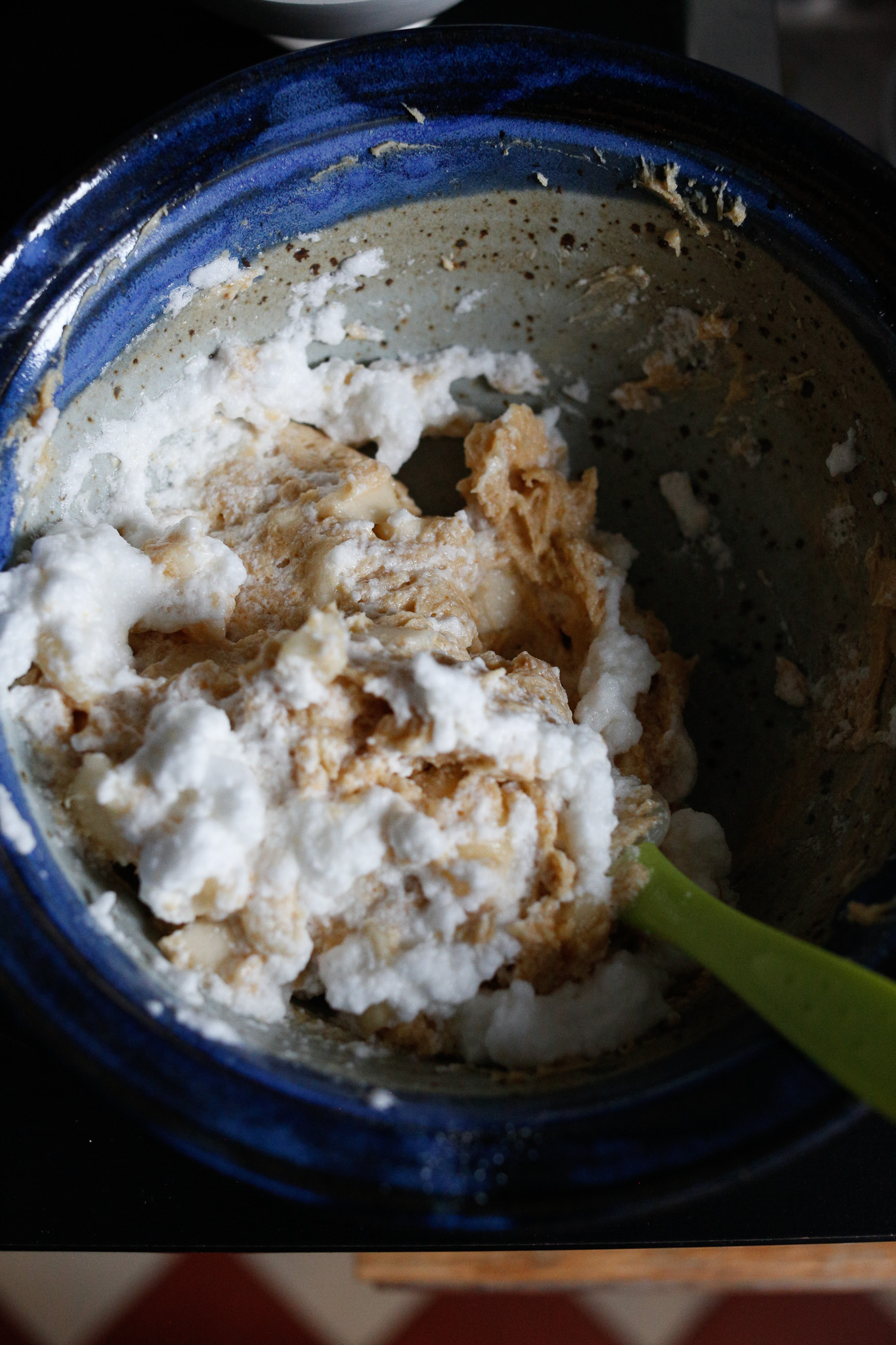 Keep folding your dough over your egg whites to incorporate