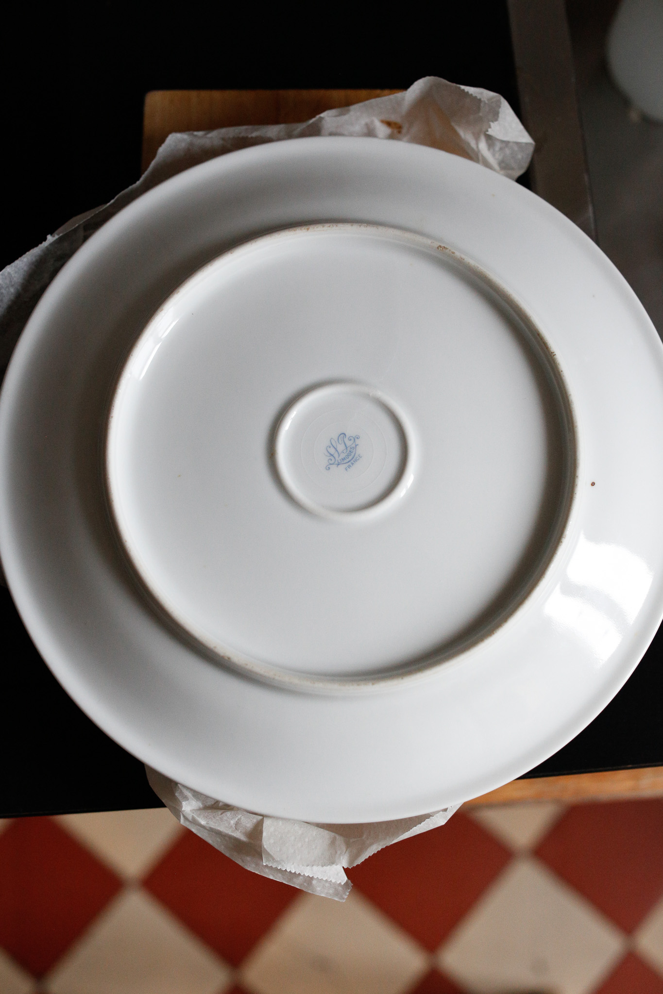 Put your serving plate over the cake pan and flip it over so that it falls directly onto your serving plate