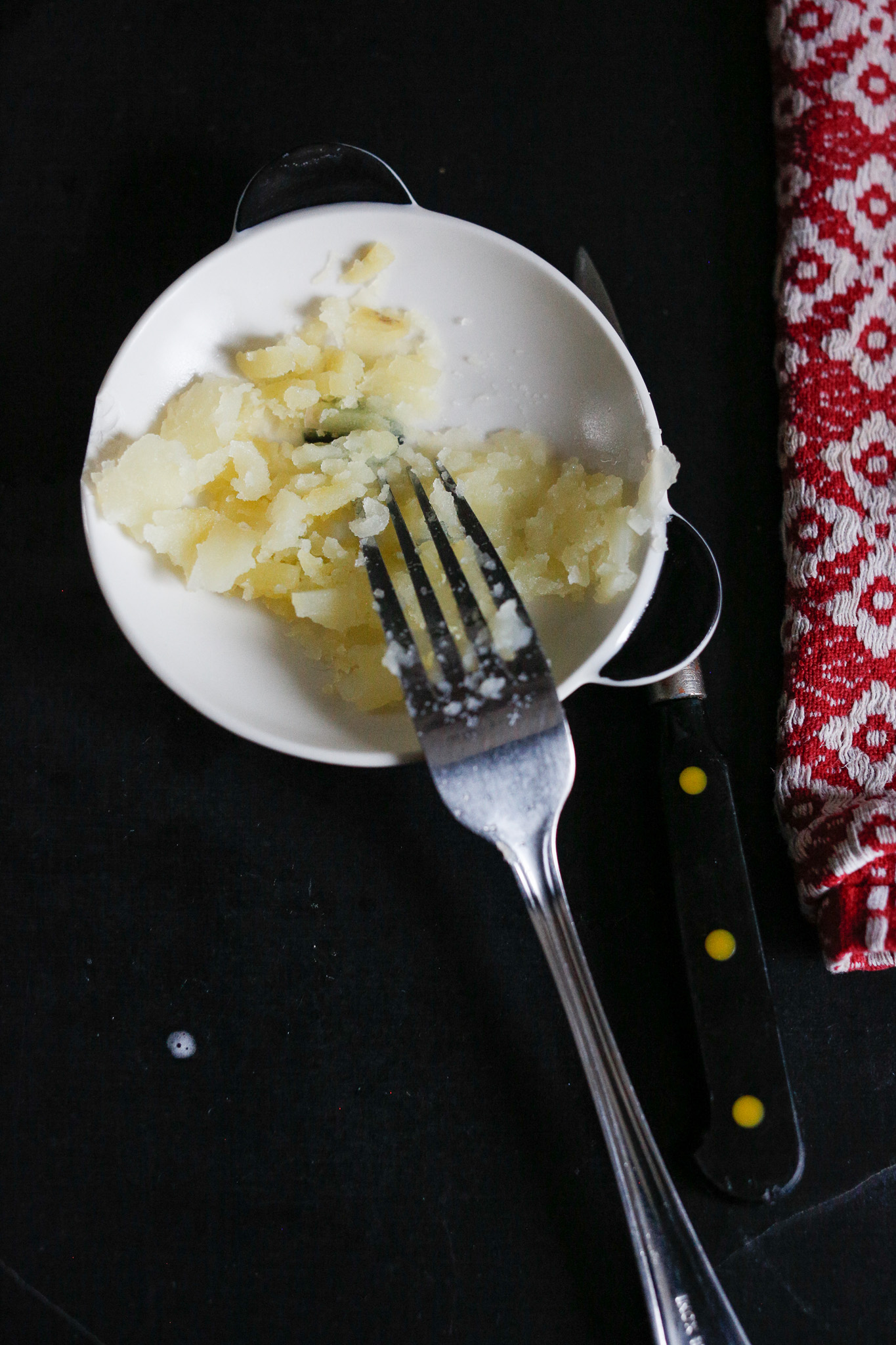 I am known for undercooking my potatoes so I'll take out a few and smash them to really know if they are cooked. Usually sticking a knife in them works. You want no resistance