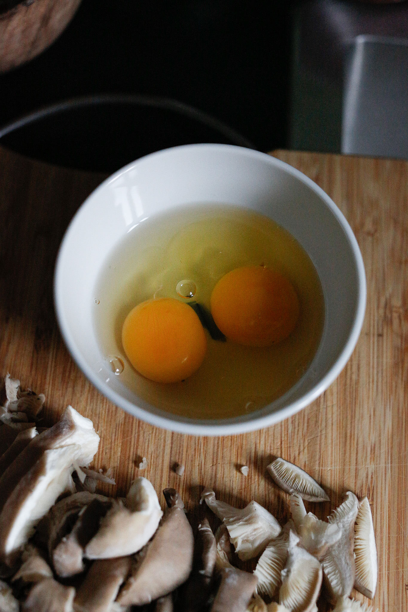Eggs cracked and ready for stirring