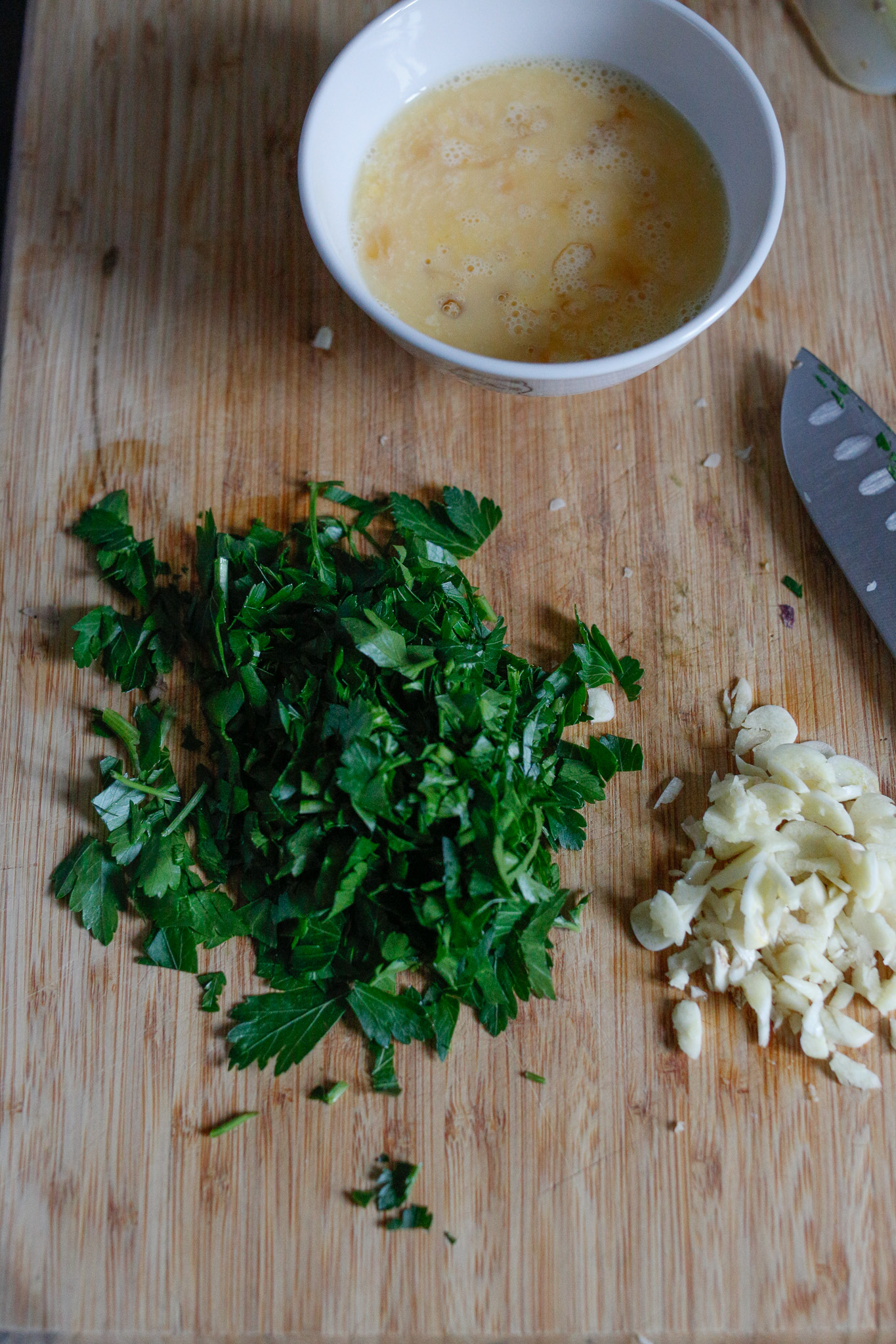 Prepare your parsley, you'll be adding your garlic and parsley at the same time