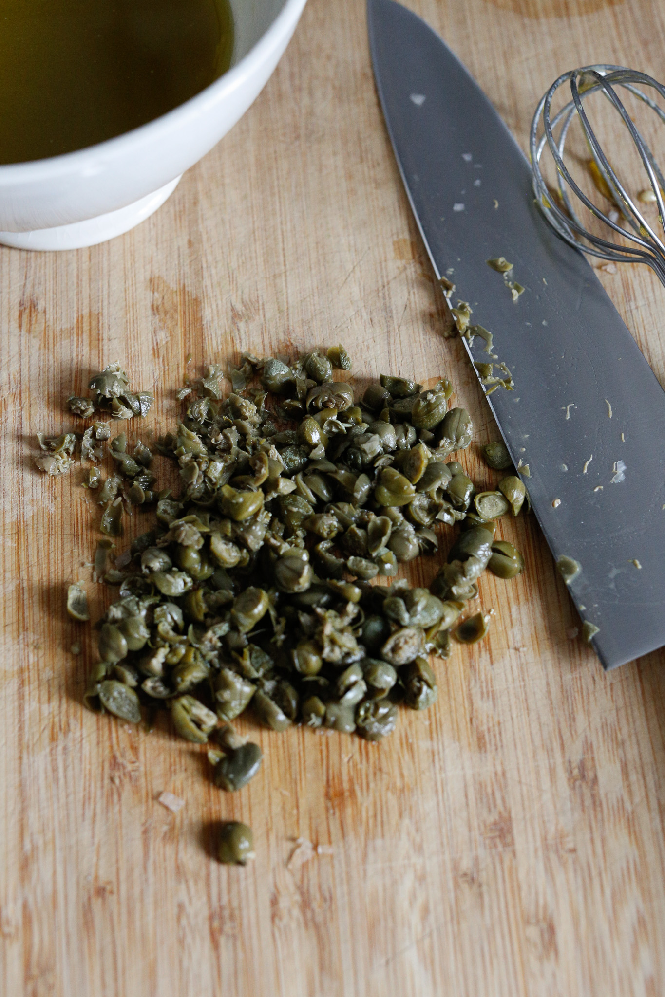 Roughly chop up your capers in order to disperse the flavor more