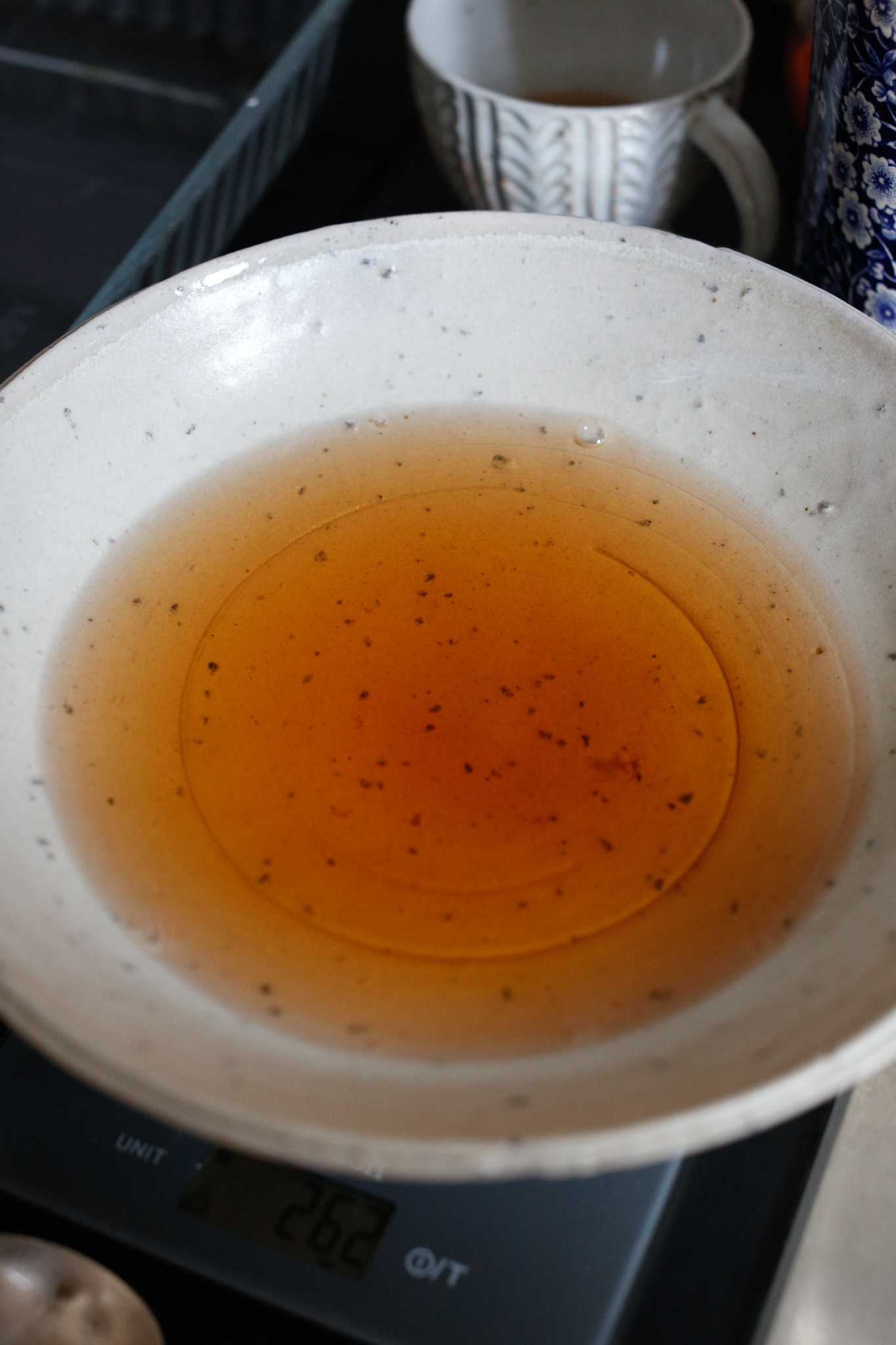 Choose a shallow bowl that will be good for dipping your ladyfingers. Add your Vine peach liquor, orange blossom water and water