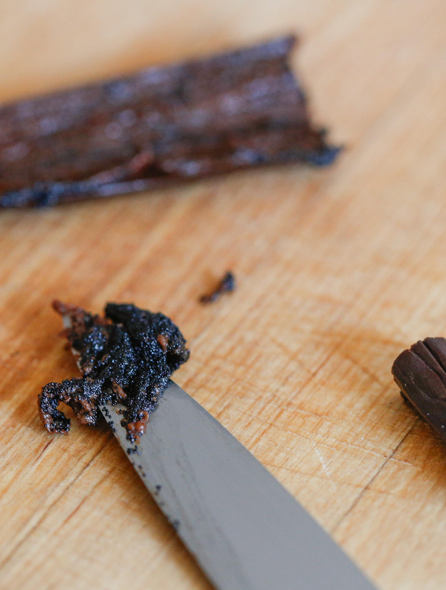 Scrape your vanilla bean seeds out with a knife after slicing it lengthwise down the side