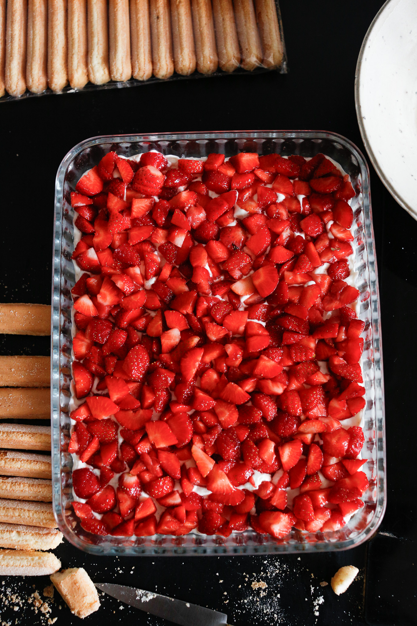 You should have a nice plump layer of strawberries. Use them all except for the ones you reserve for the top!