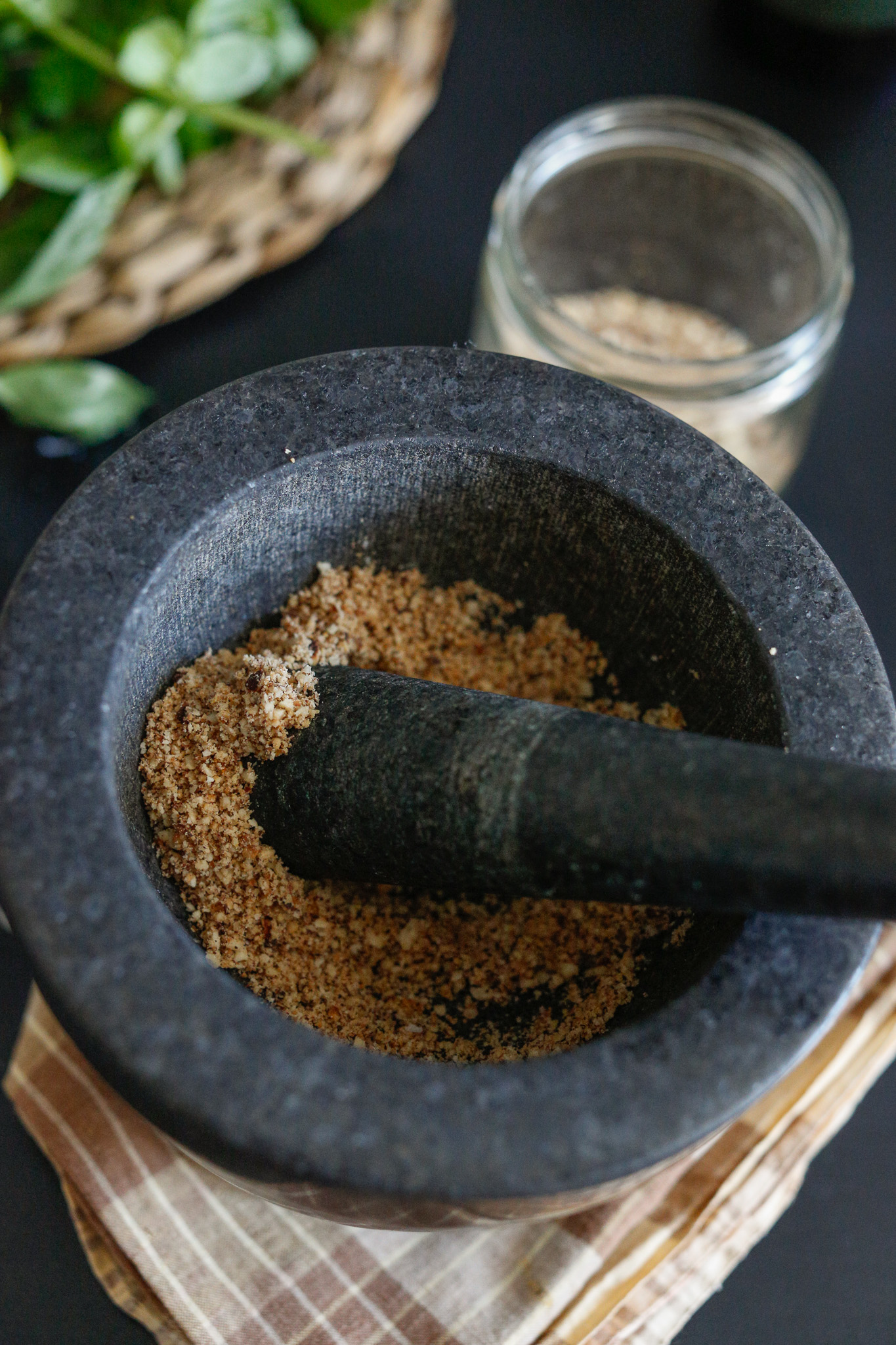 Start by crushing up your hazelnuts. Crush them right up to the point when they start to show oil. This is when it can turn pasty and we don't want this!