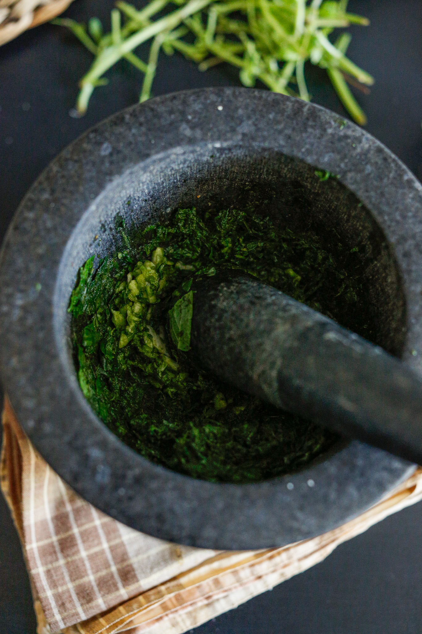 Make sure to stir your pestle around the mortar as this helps with the breakdown of the leaves