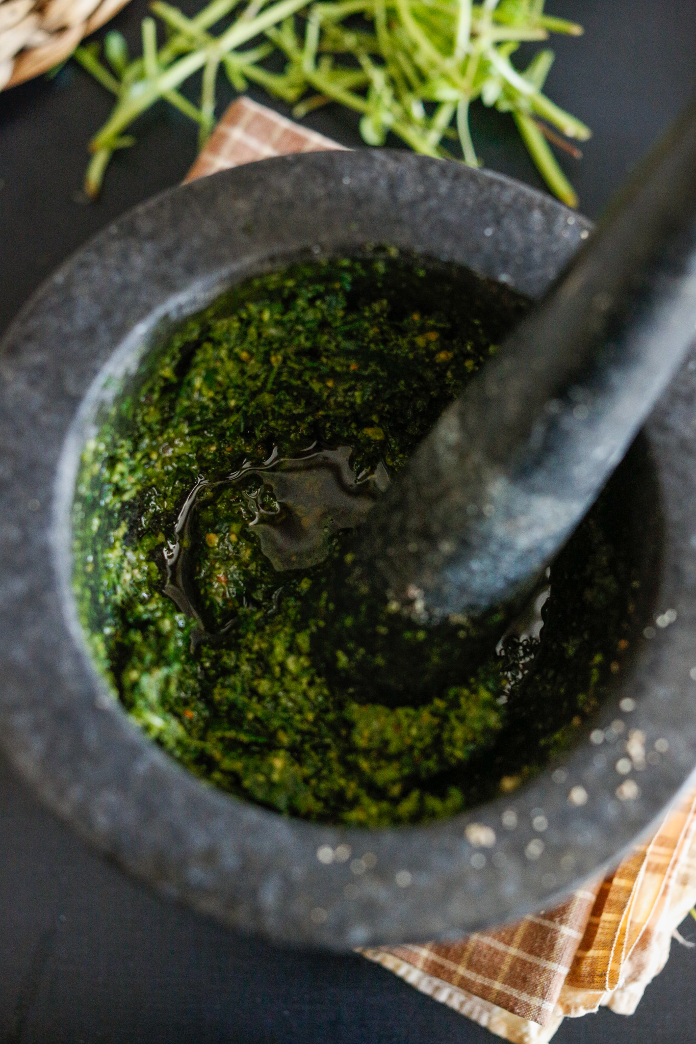 Add in your olive oil slowly until you get it to a consistency that you like