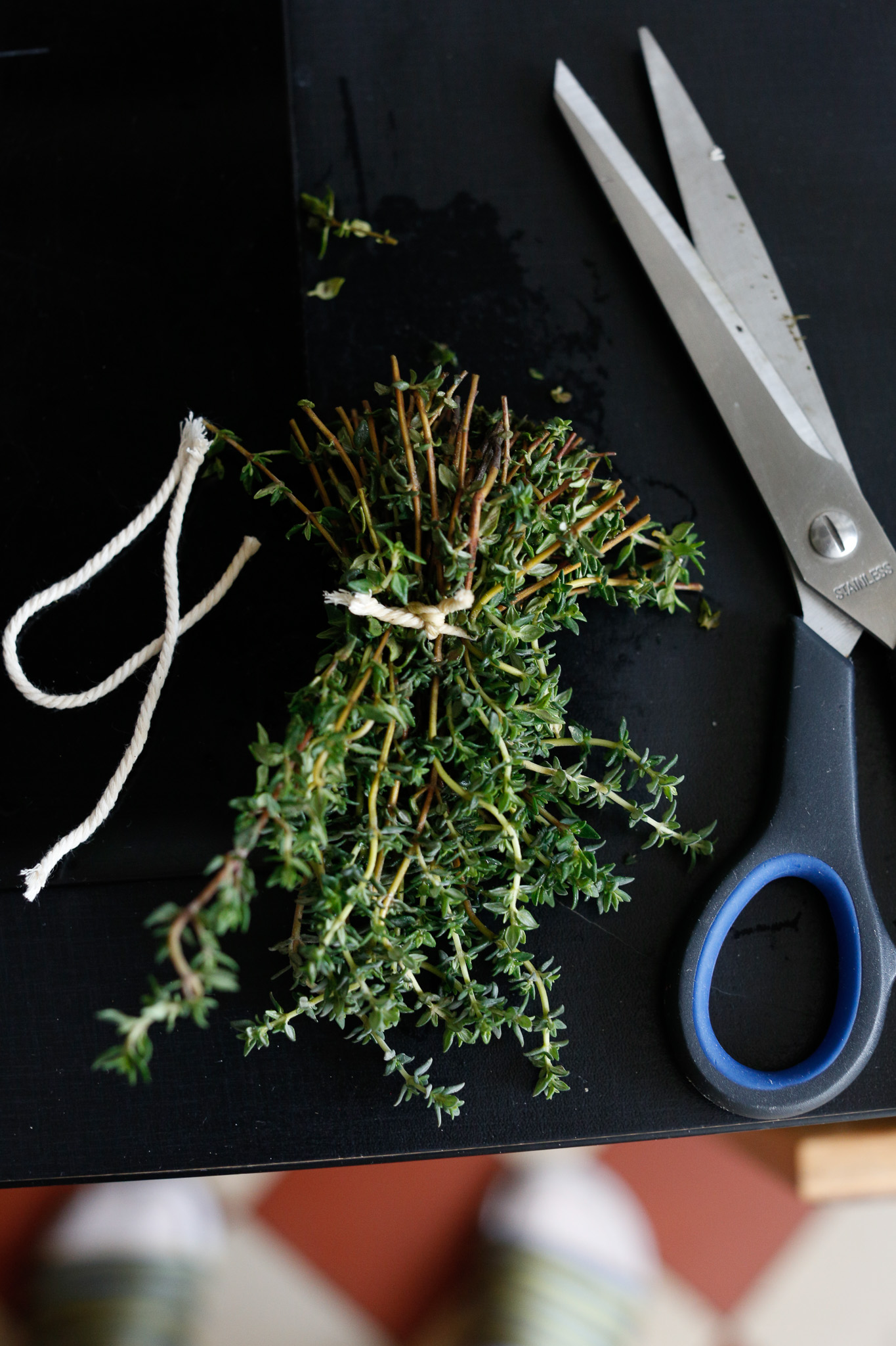 While your onions are browning again, tie up your branches of thyme. This is simply so you don't have to go fishing for branches.