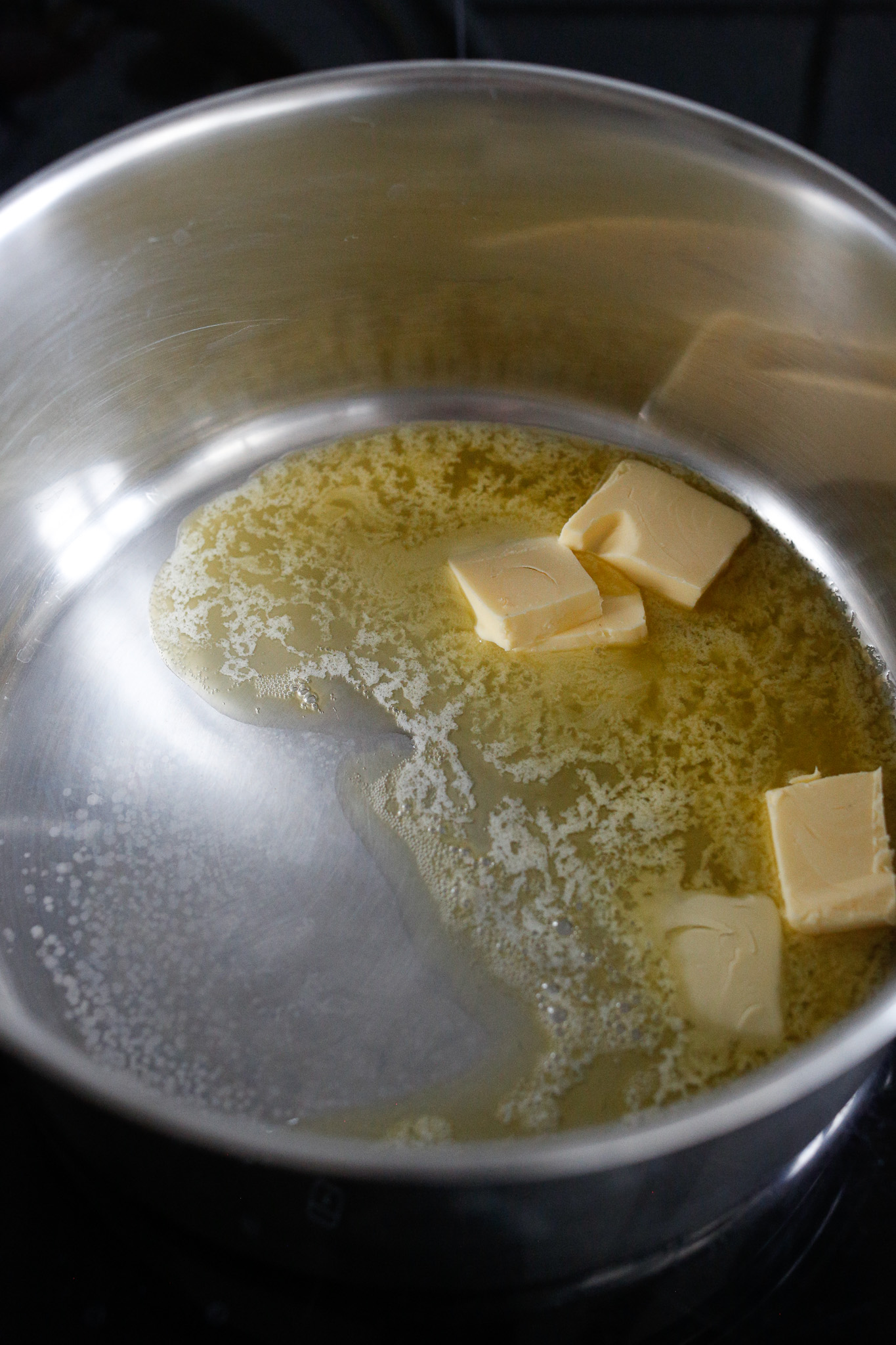Melt your butter on medium heat soup pot