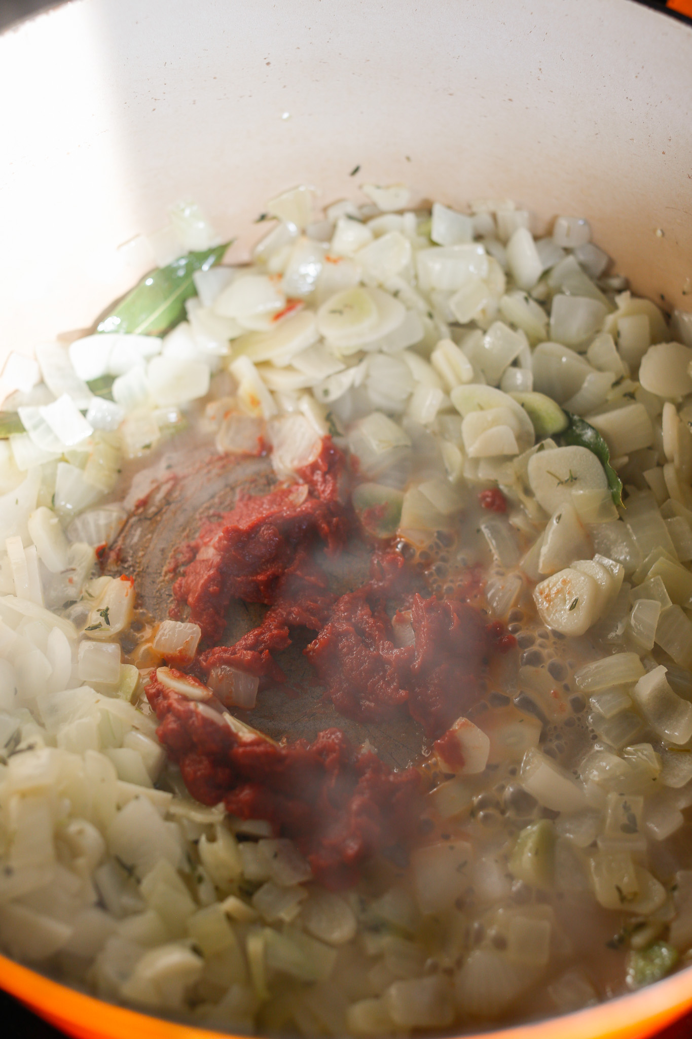 Add in tomato paste