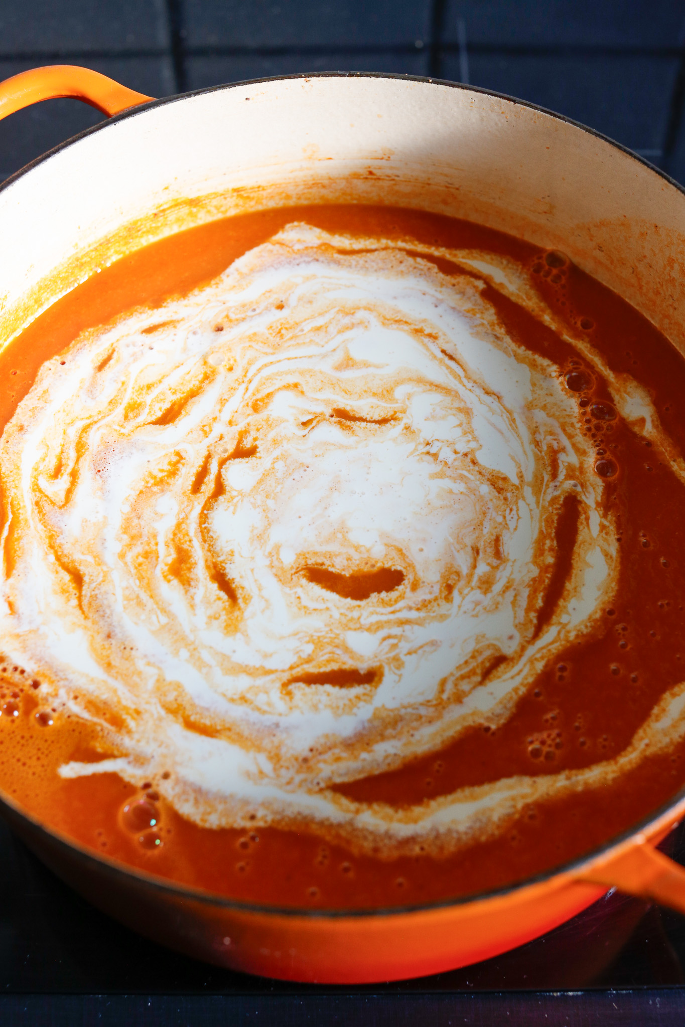 Once the soup is back in the soup pot, add in your cream and cook for a few minutes