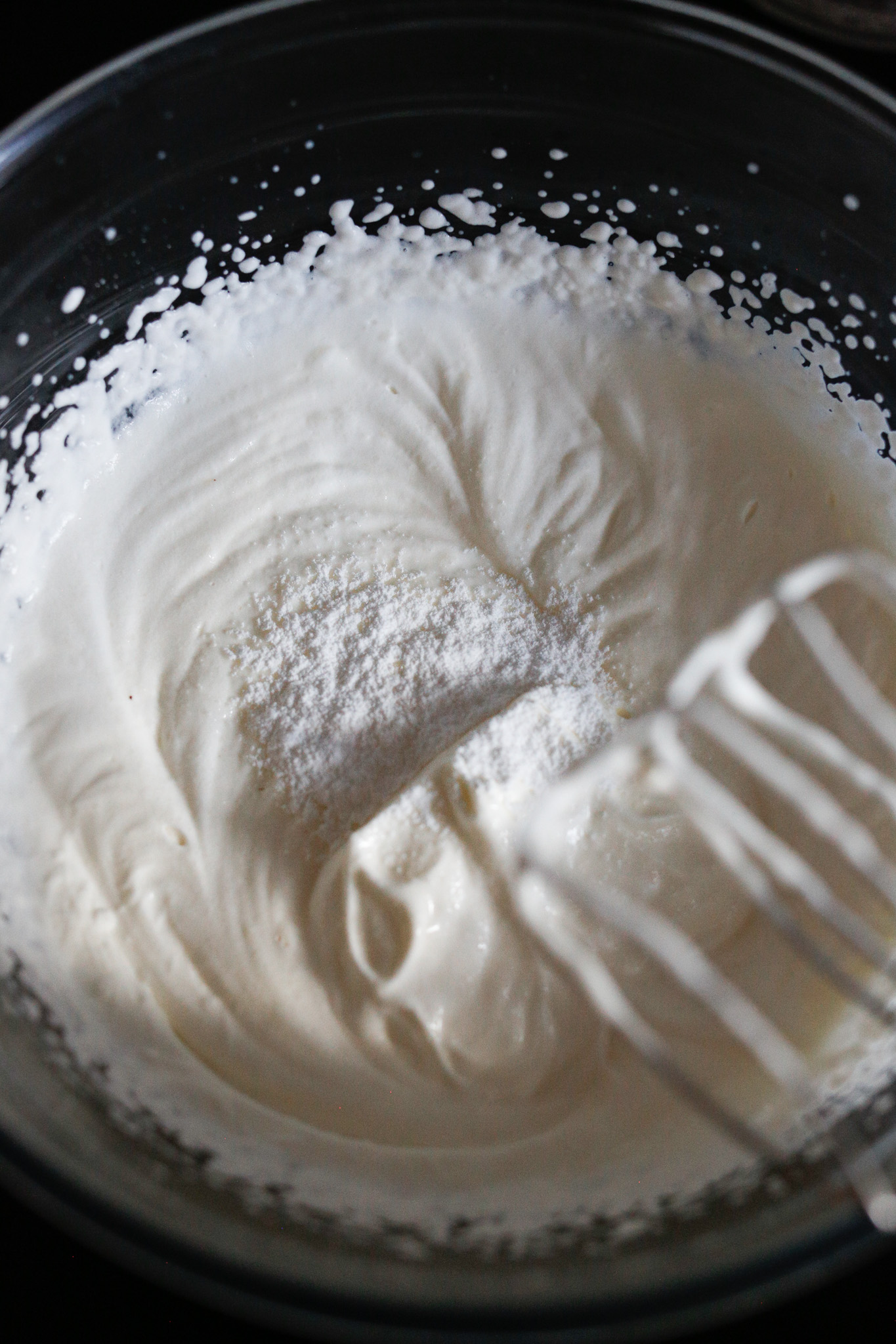 When you start to see little waves in your cream you can add in your sugar and keep beating