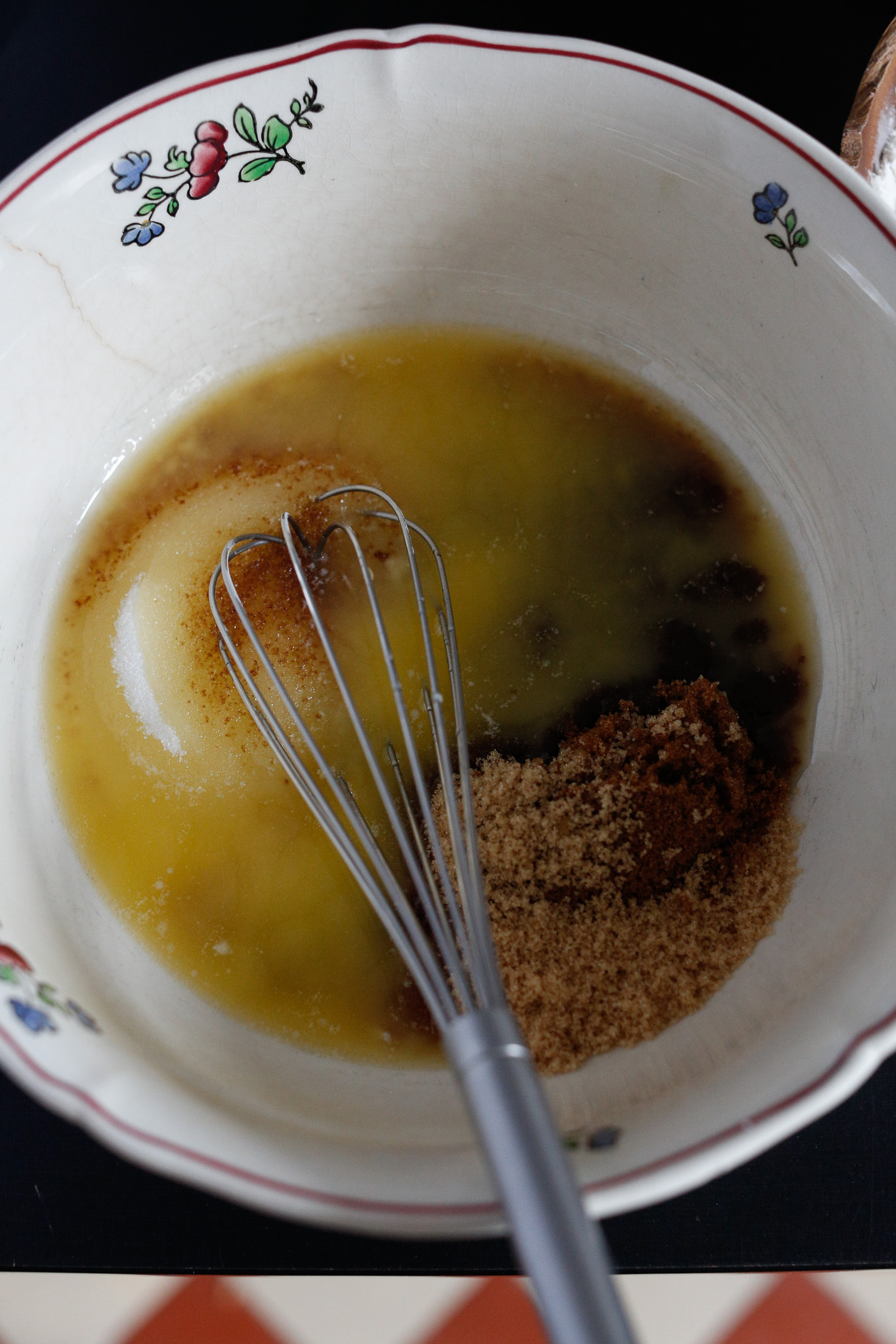 After measuring out your sugars, pour in your butter and whisk.