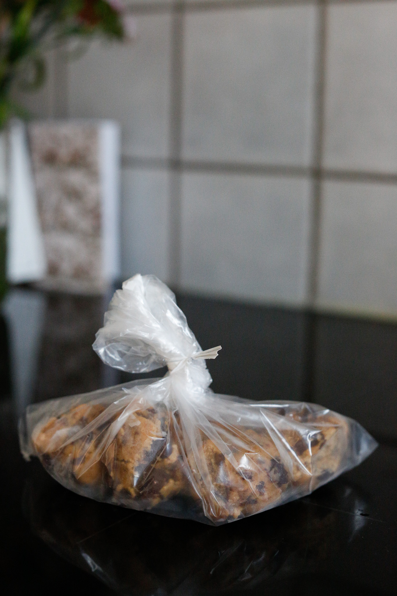 Once frozen, add them into a freezer bag. When you are ready to cook, lower your original oven time by 20 degrees. In this case 140c. Bake for about 16 minutes straight out of the freezer for a crispy yet gooey cookie!