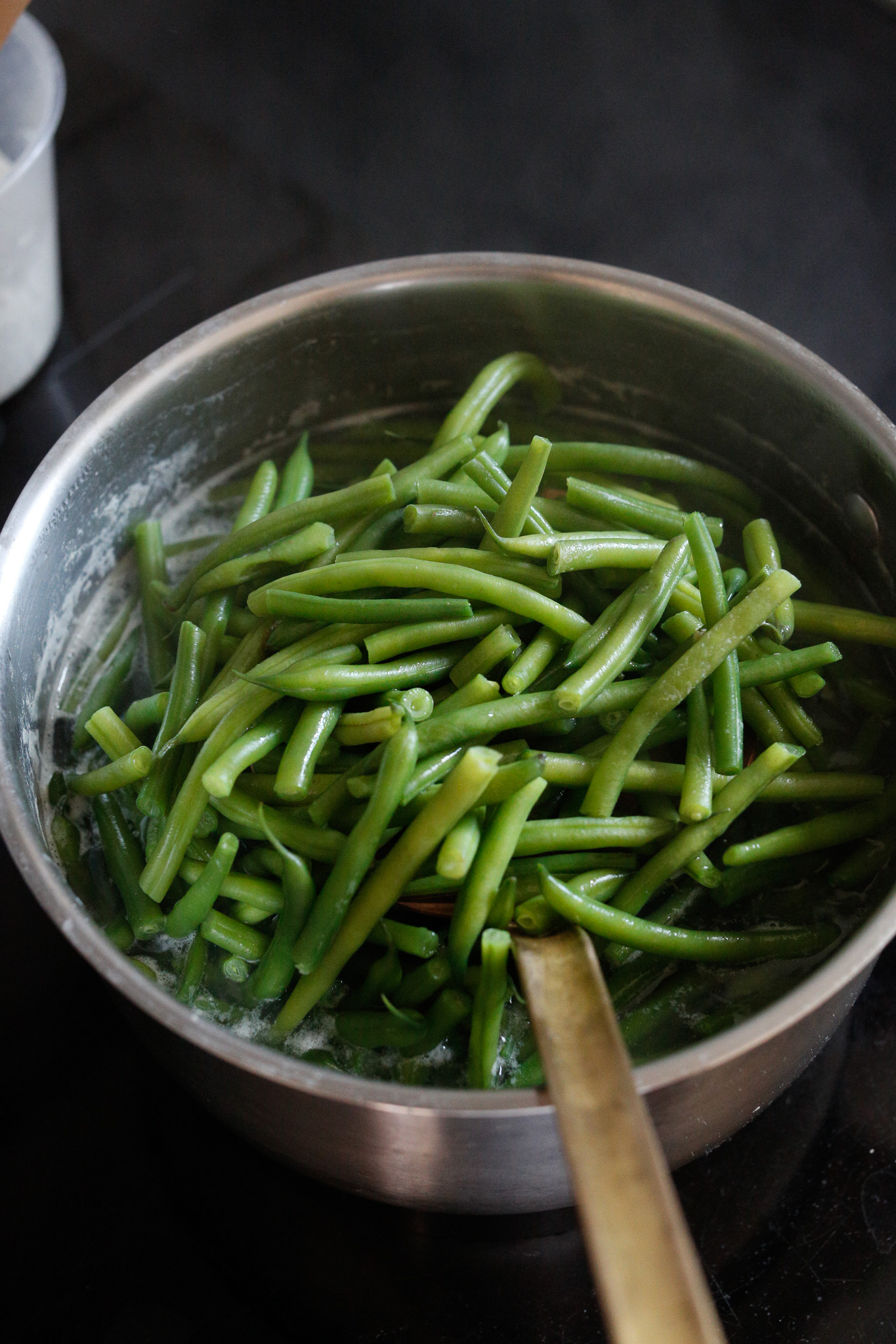Bring your pot of water to boil and salt it more than pasta water too cook your beans in. I like a 5-6 minute cook but you must try the bean to find your ideal crunch preference.