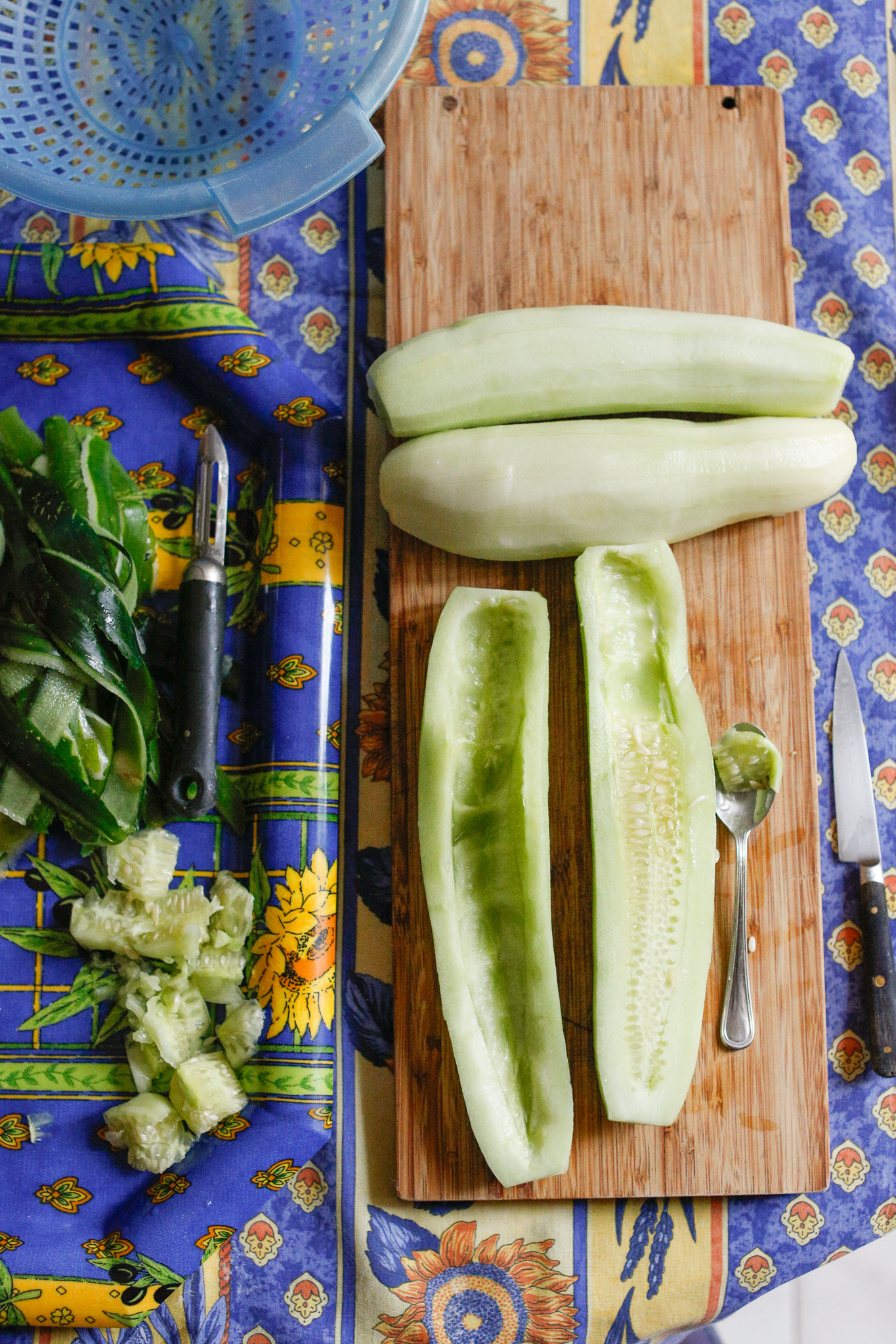 Peel and slice your cucumbers down the center. Take out the seeds.