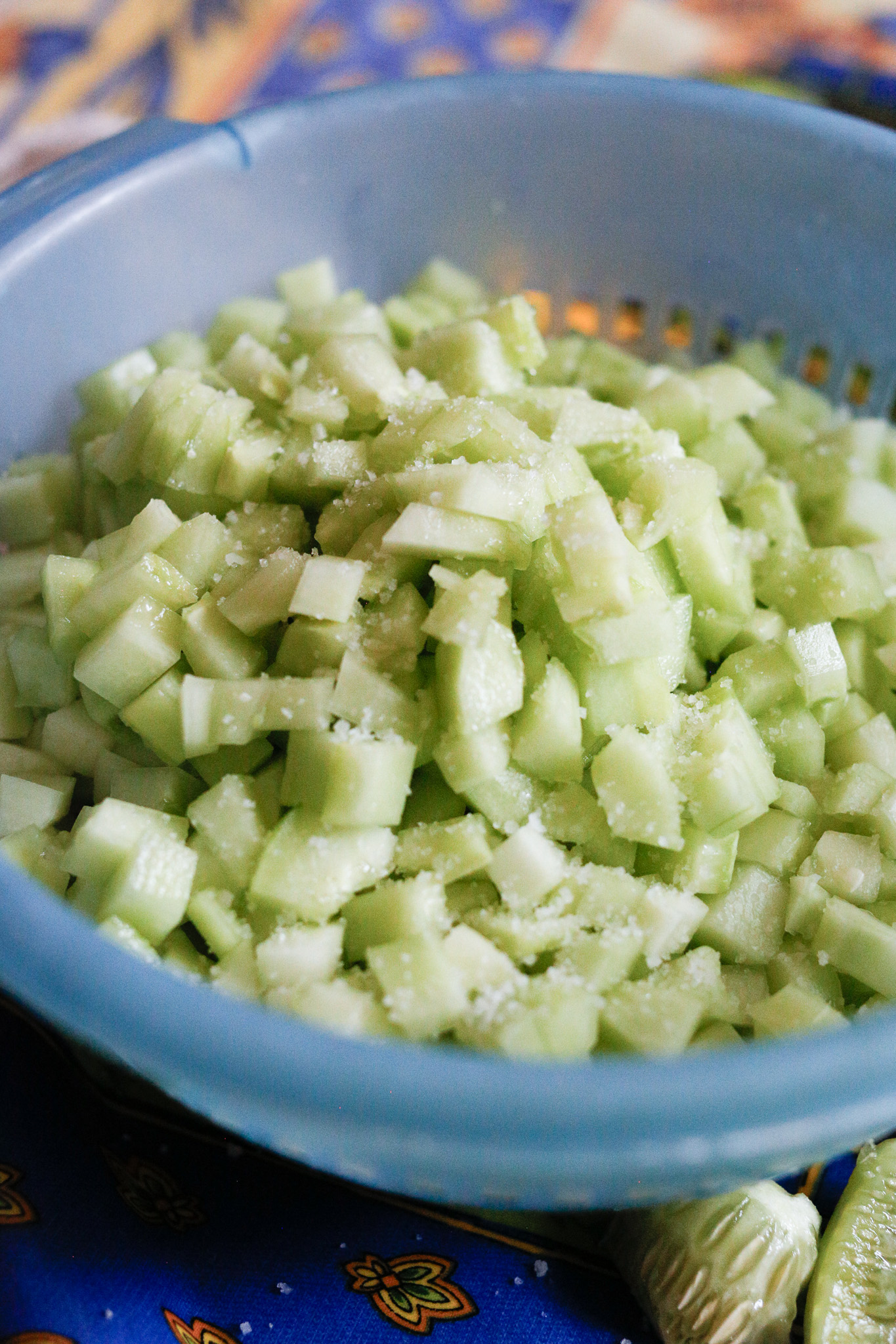 When I add a layer of cucumbers to my colander I add some salt. I use sea salt, I just do a reasonalbe layer. Nothing wild.
