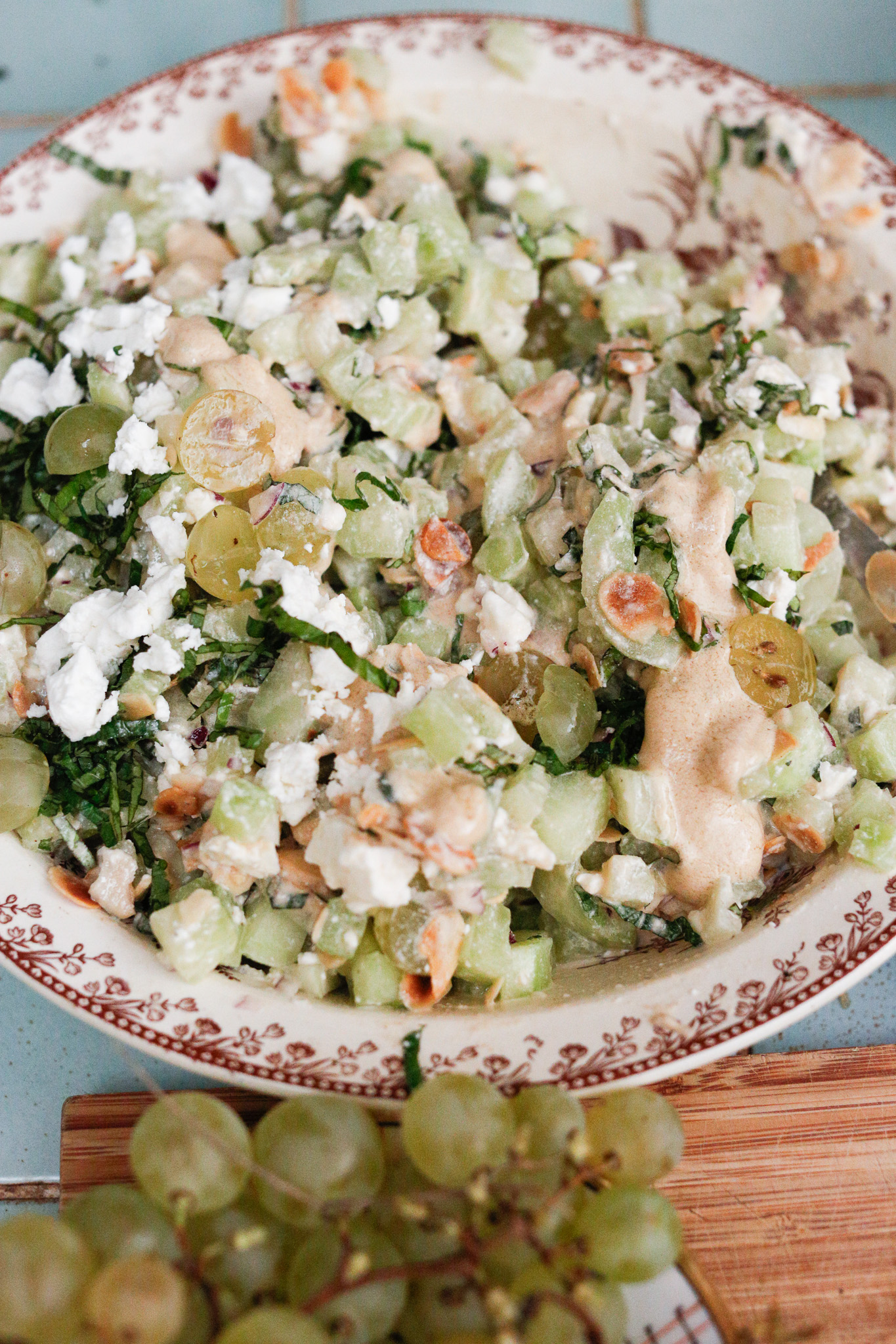 Give it a gentle mix. Try to fold the ingredients on top of each other so that they don't smash and look ugly. Taste your salad and adjust. Add more vinaigrette, salt, lemon if need be.