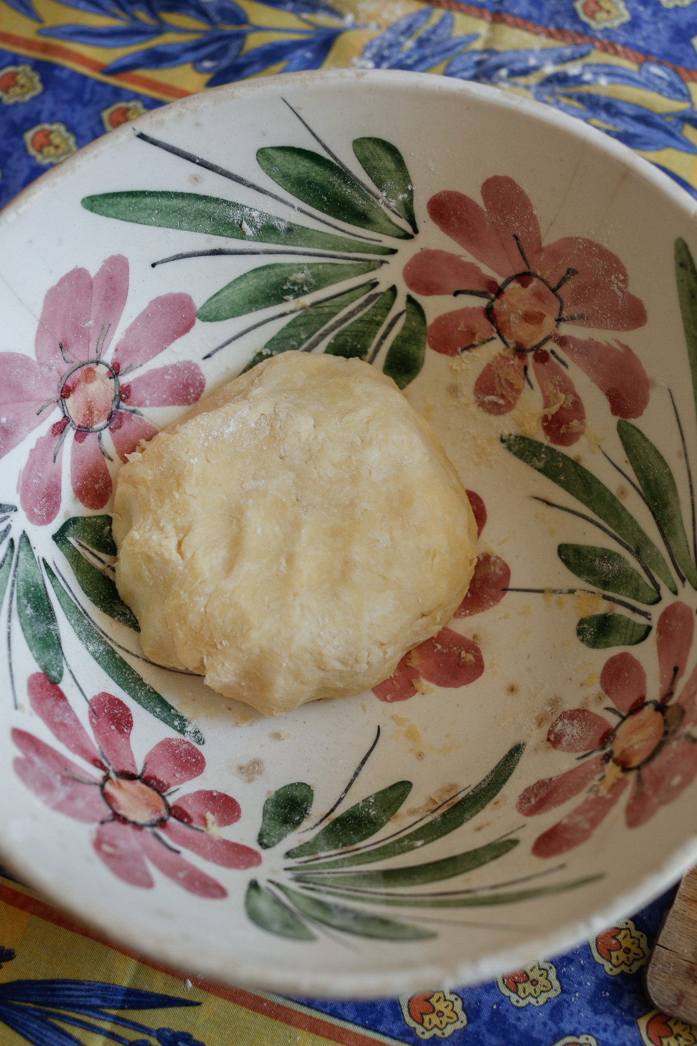 There she is. Once your dough looks like this you can flatten out into a disk to make the start of the rolling process earlier. I didn't do this ...