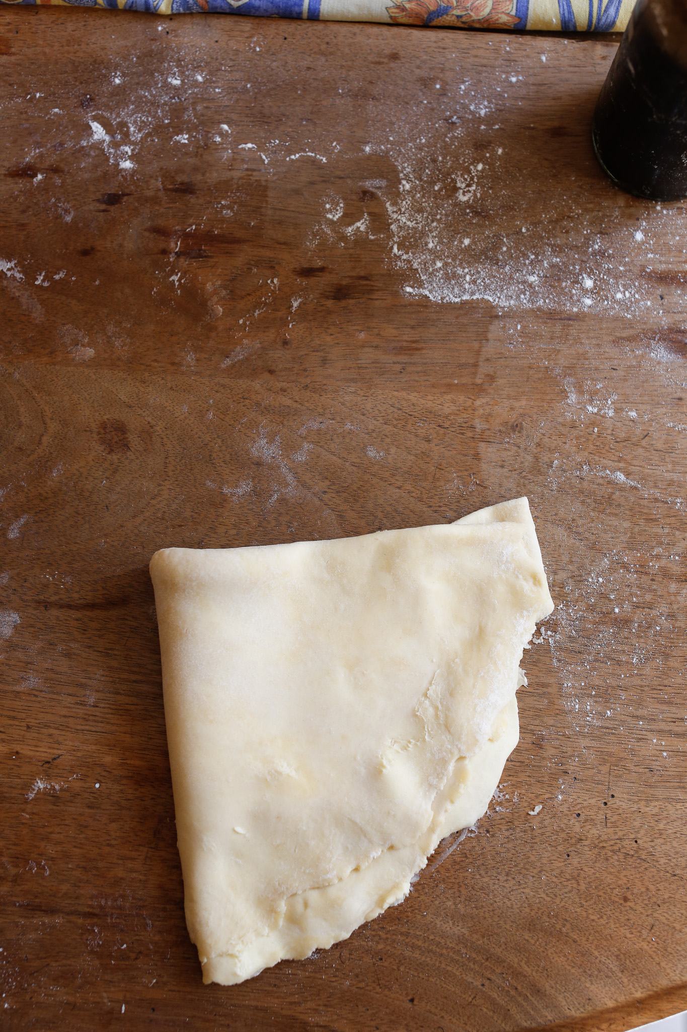 The quarters part. This is much easier to lift and transfer than a big, wide thick/thin galette dough!
