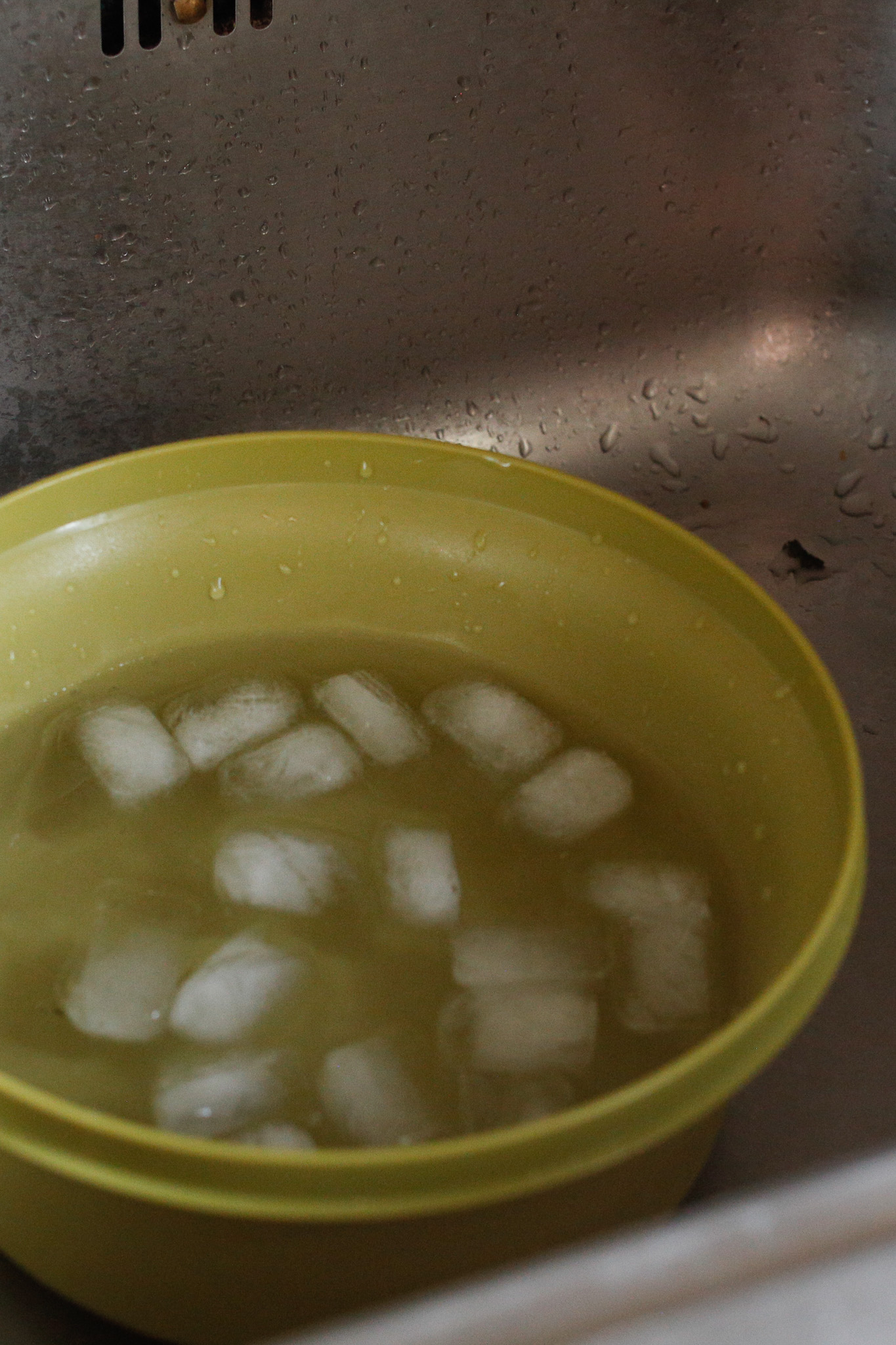 While the beans are cooking you and your toddler can prepare an ice bath for the beans once they are done. They cook quickly 4-6 minutes based on your cook preference.