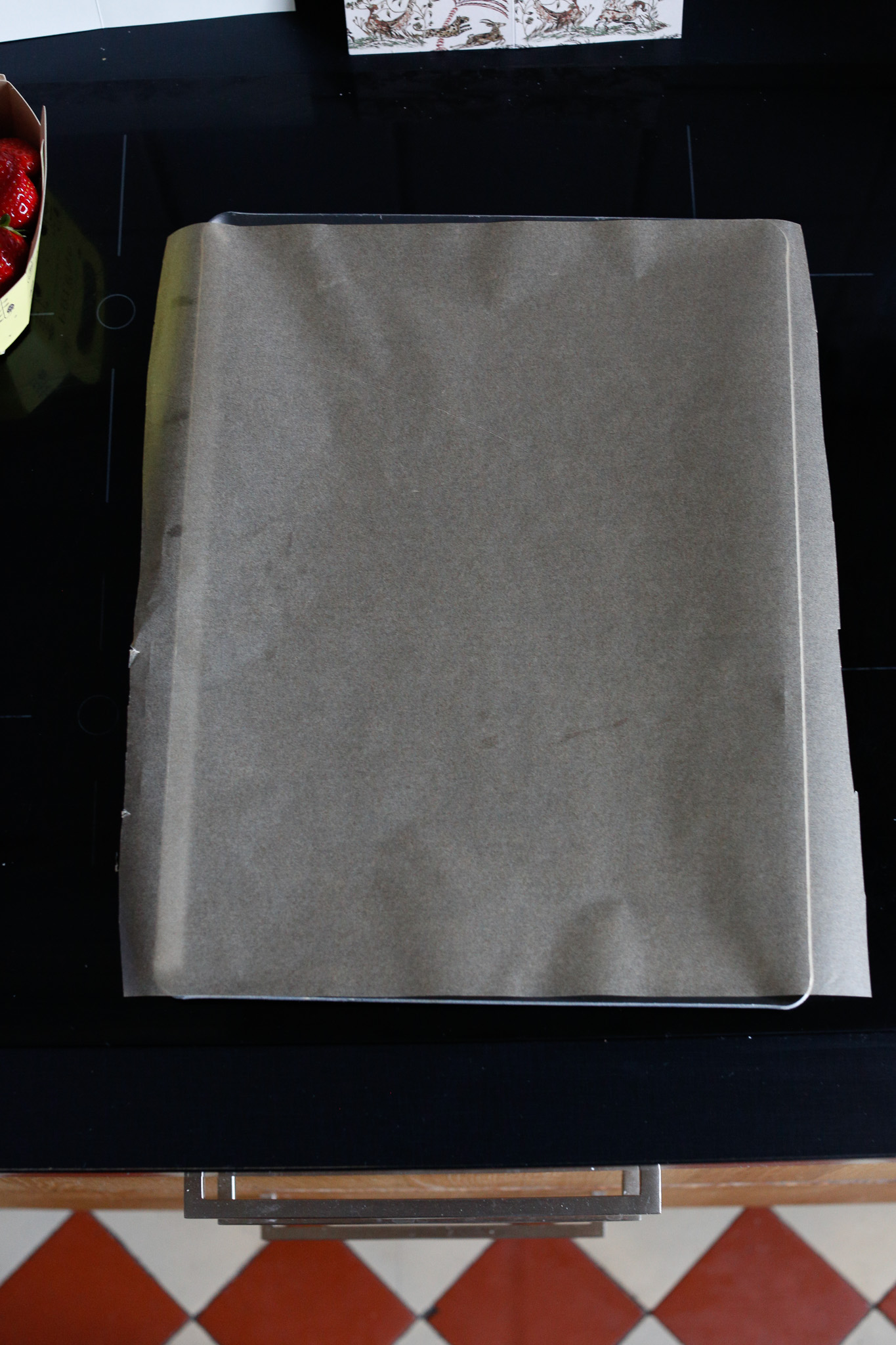 Prepare your baking tray with a piece of parchment paper.