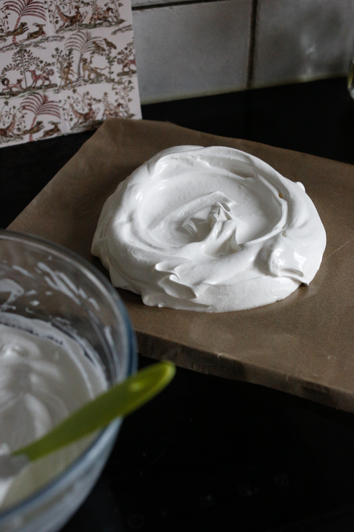 Add your whites onto your baking sheet and spread them out into a circle.