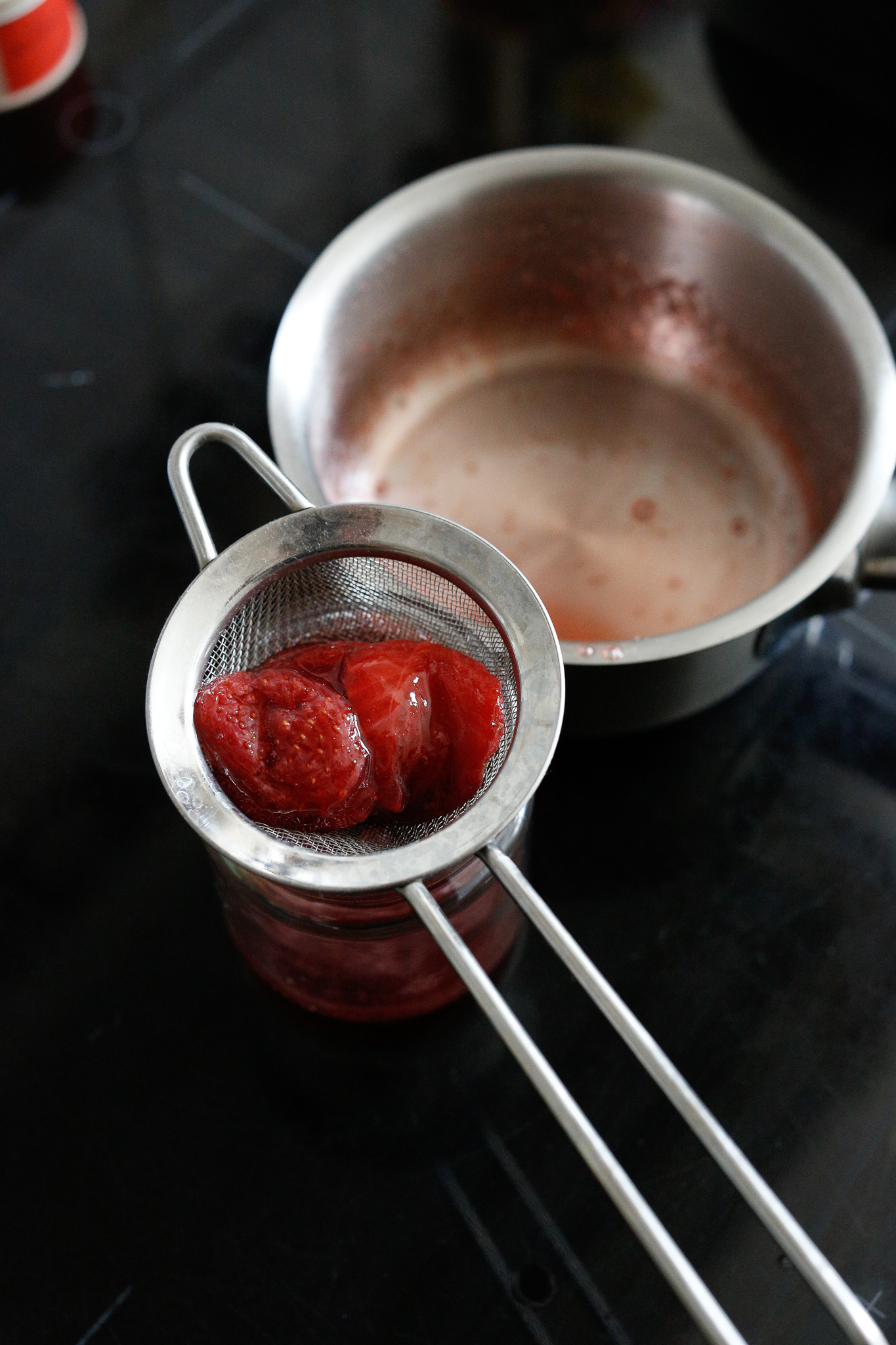 For more sauce & more flavor, let your strawberries fall into a sieve to drip.