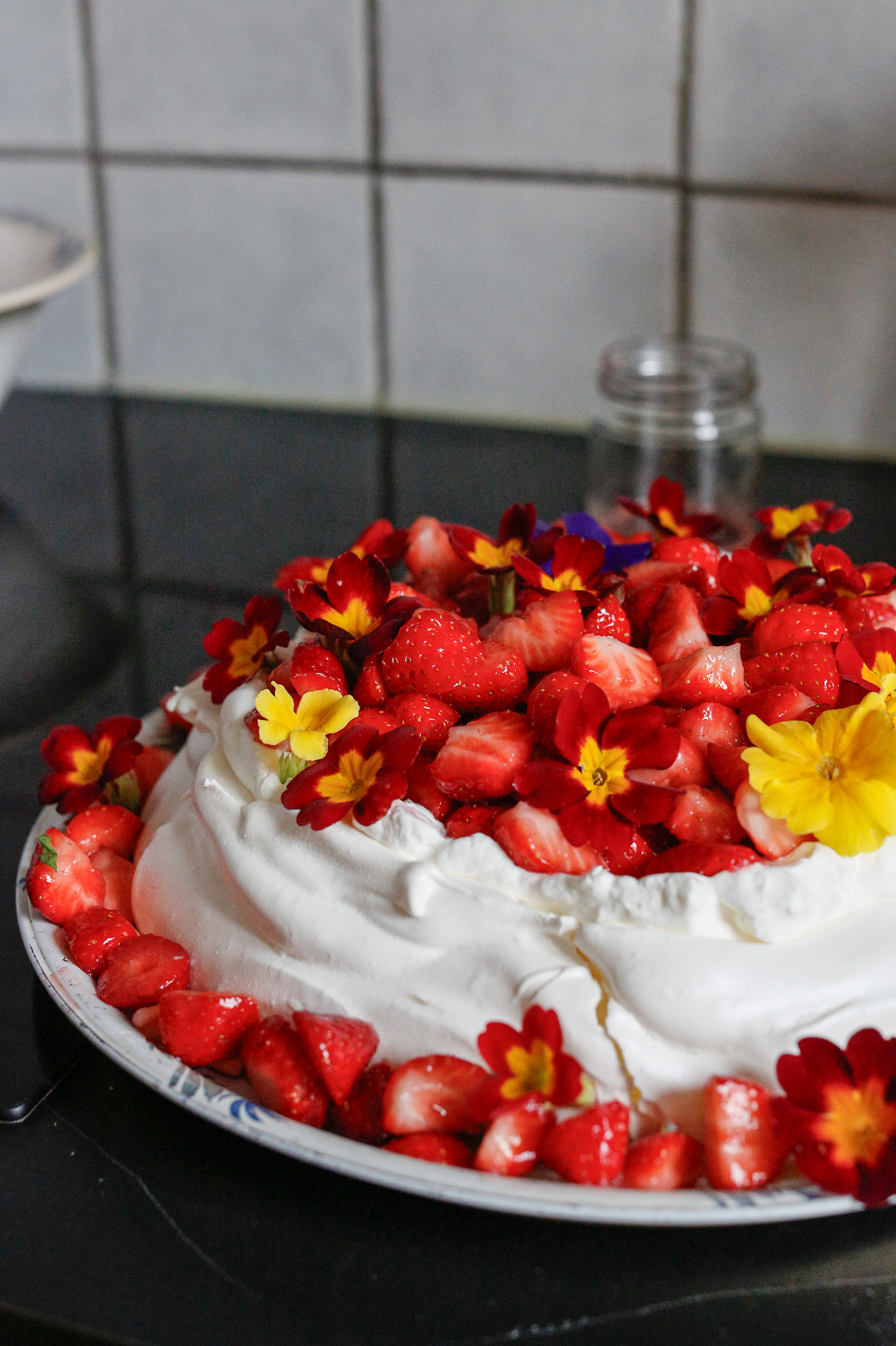 I had gotten some edible flowers for this Pavlova so I added those too. My grandma would have never done this!