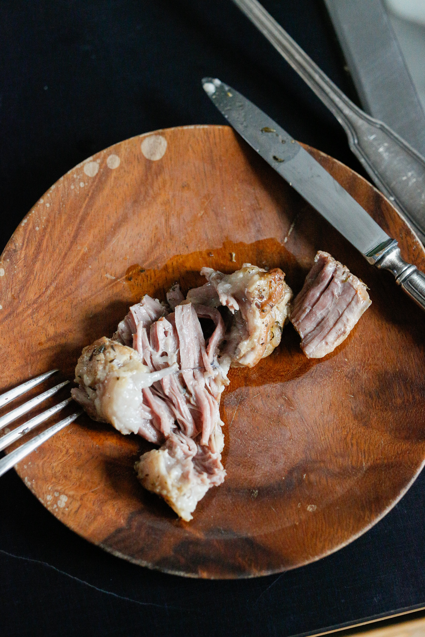 If I have the time, I like to pull out the pieces of pork and pull apart the meat like this. If I don't have time it's just as good and you can pull it apart in each individual bowl.