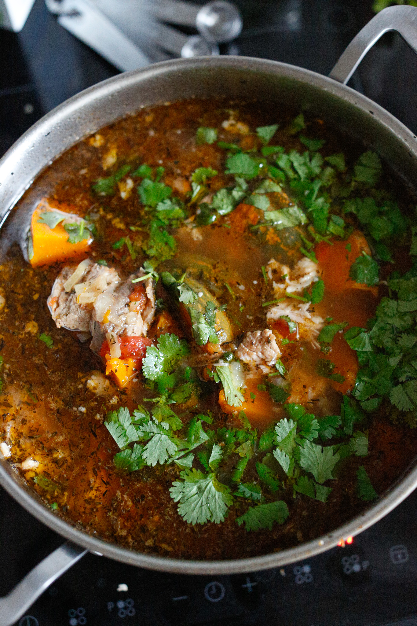 After serving the individual soup I toss the remaining cilantro into the stew.