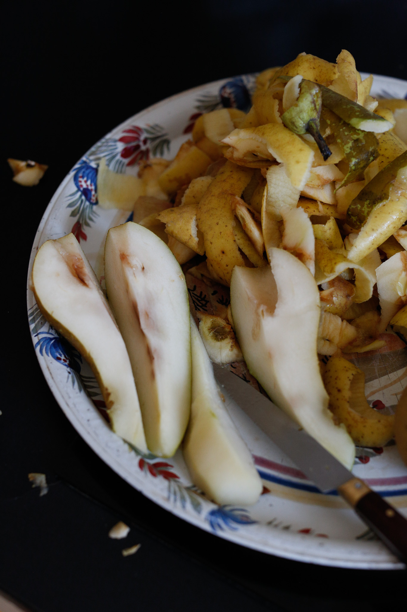 For the pears, since they are usually softer than the apples I core the bottom slightly, cut them up into fours, take out the seeds and then peel them.