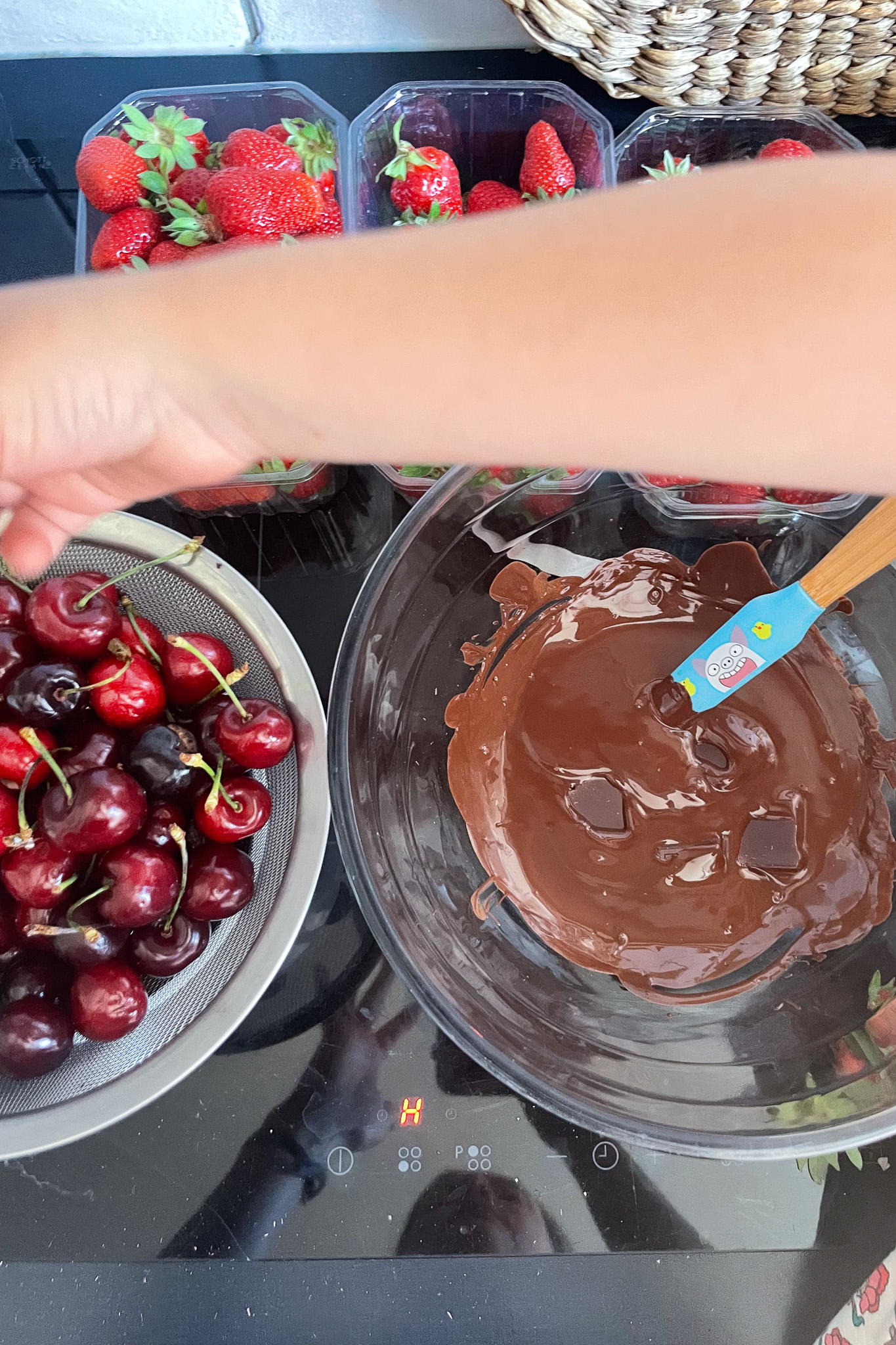 After filling your pot 1/3 the way with water, put your heatproof bowl on top and turn it on medium. Break up your chocolate and add it in the bowl.