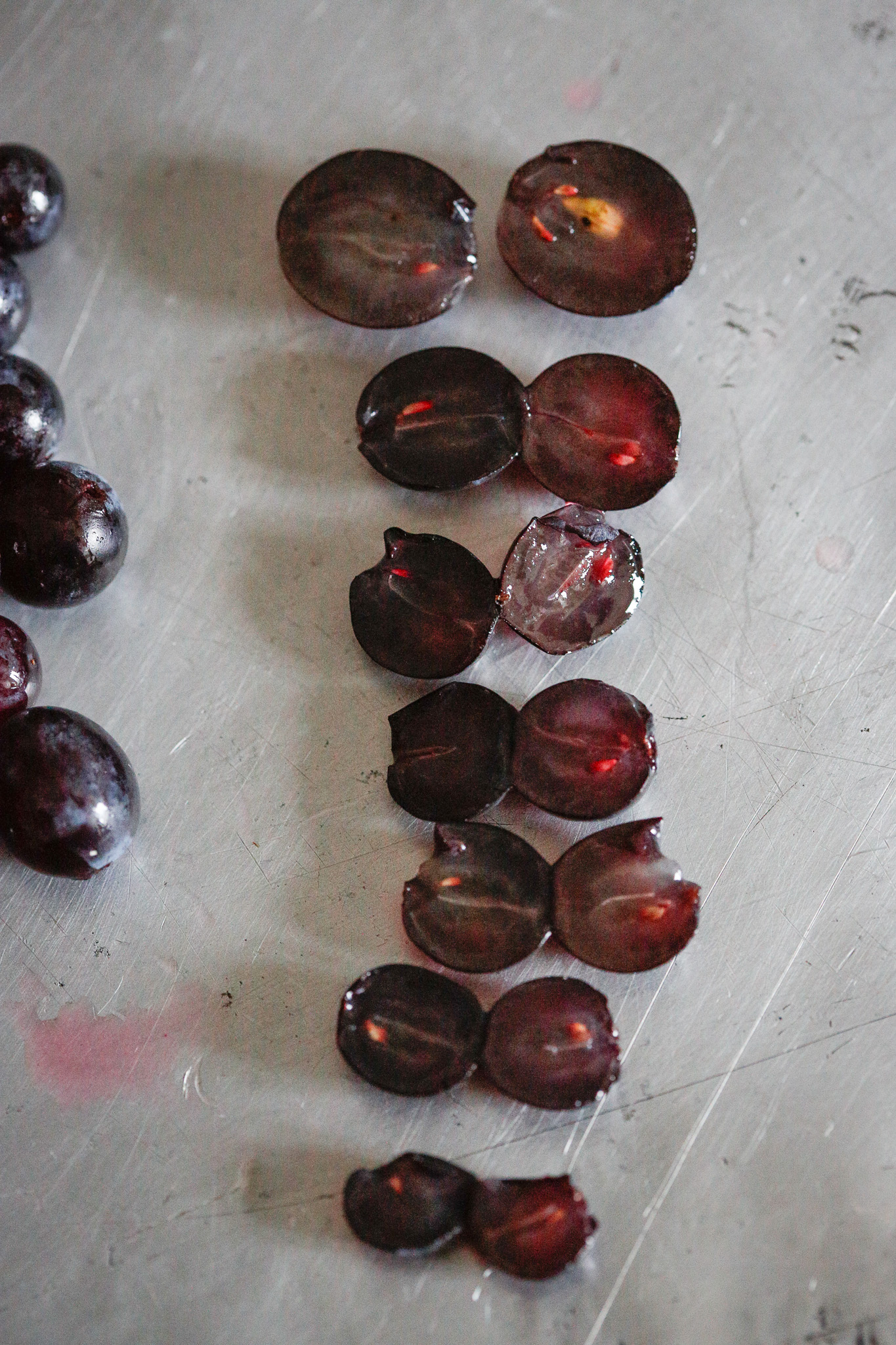 The smaller grapes may not have a large seed. I don't always extract them if they are not big. I find that they don't create much bitterness.
