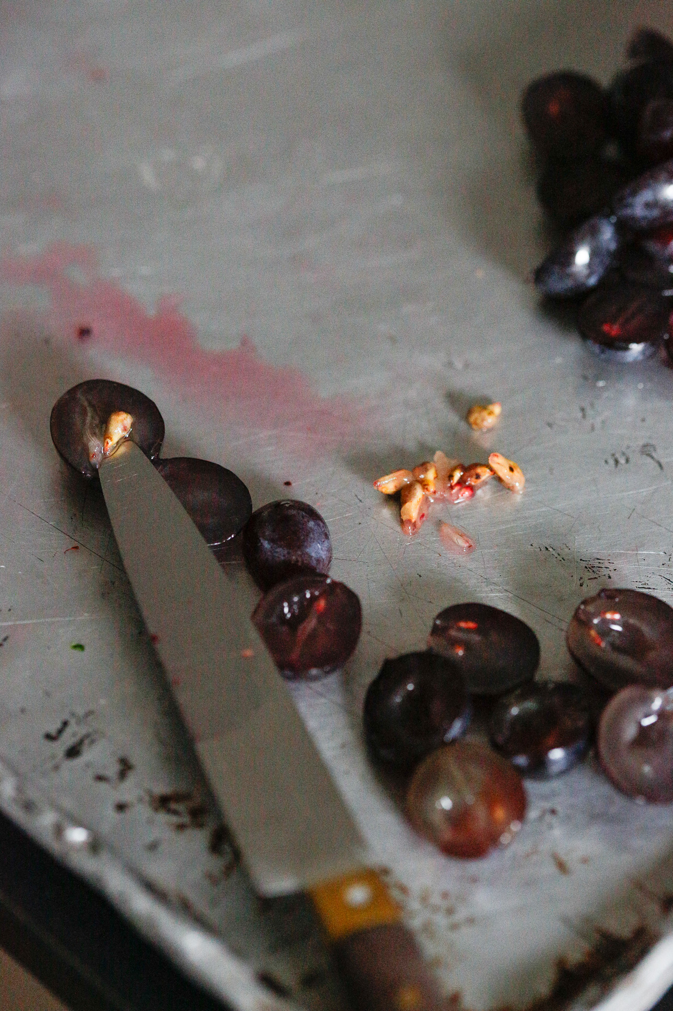 To extract the seed, pop a pointed knife under it. You may have to do a little "carving" to get her out.