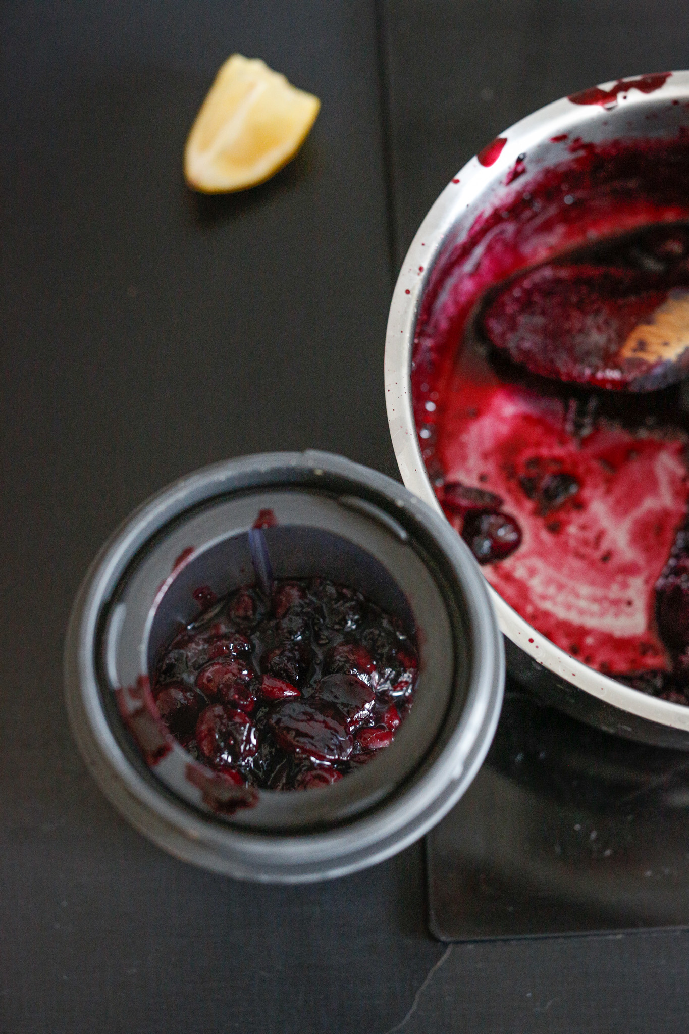Transfer your cooked compote into a food processor of sorts or bullet. Add in a few drops of lemon and blend her up.